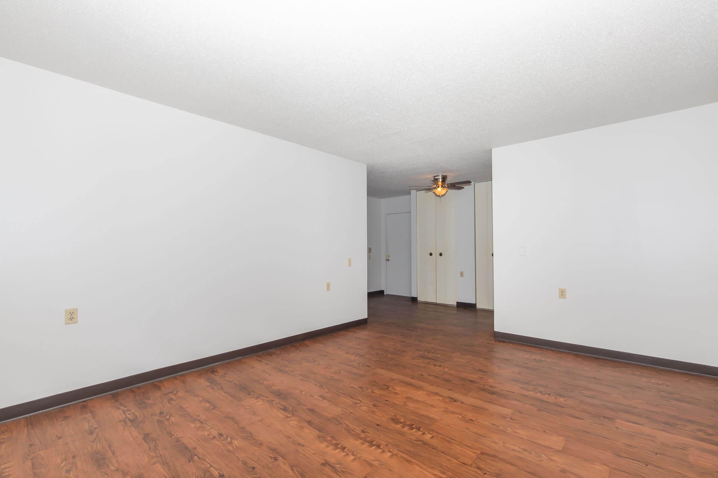 a kitchen with a wood floor