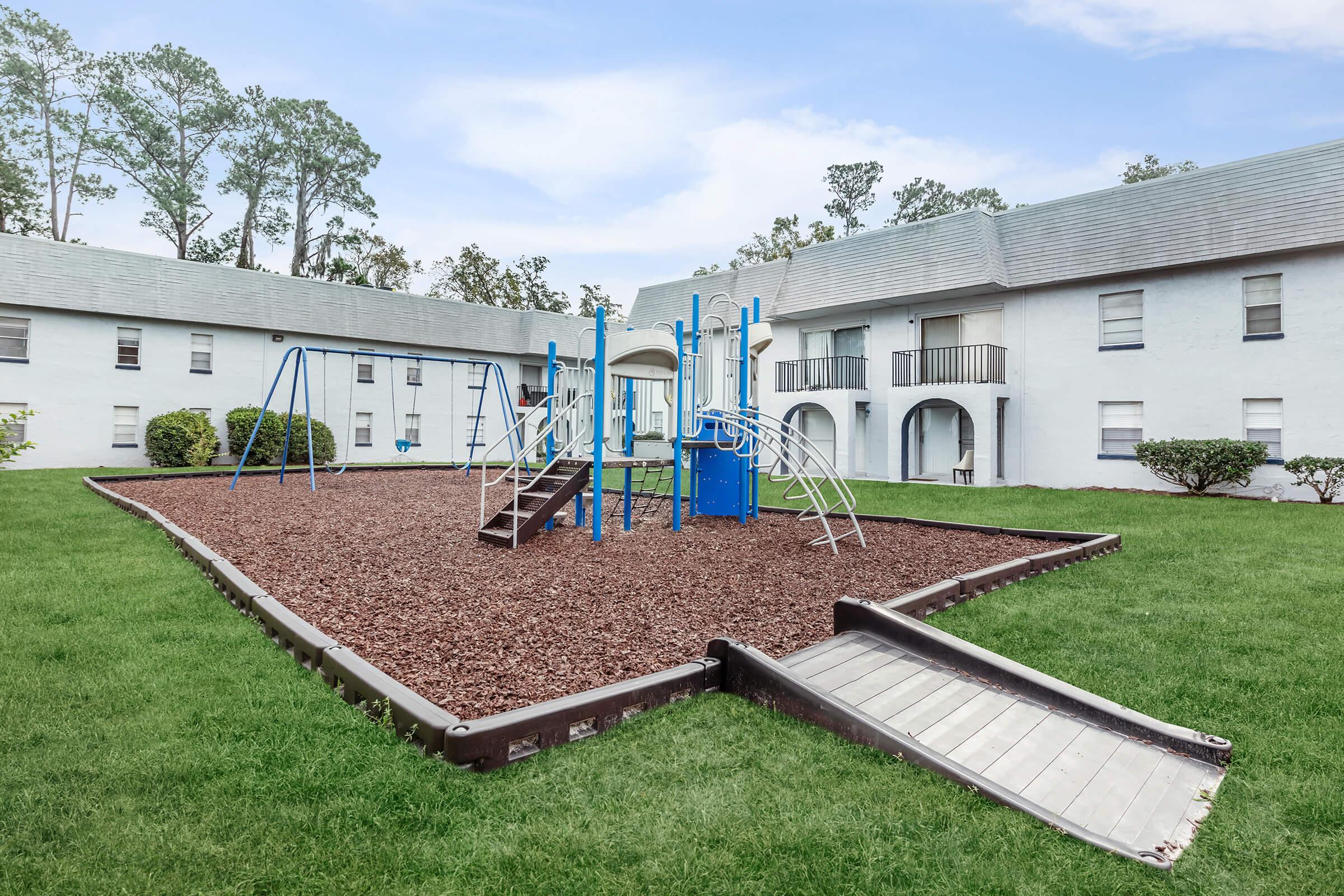 a large lawn in front of a house