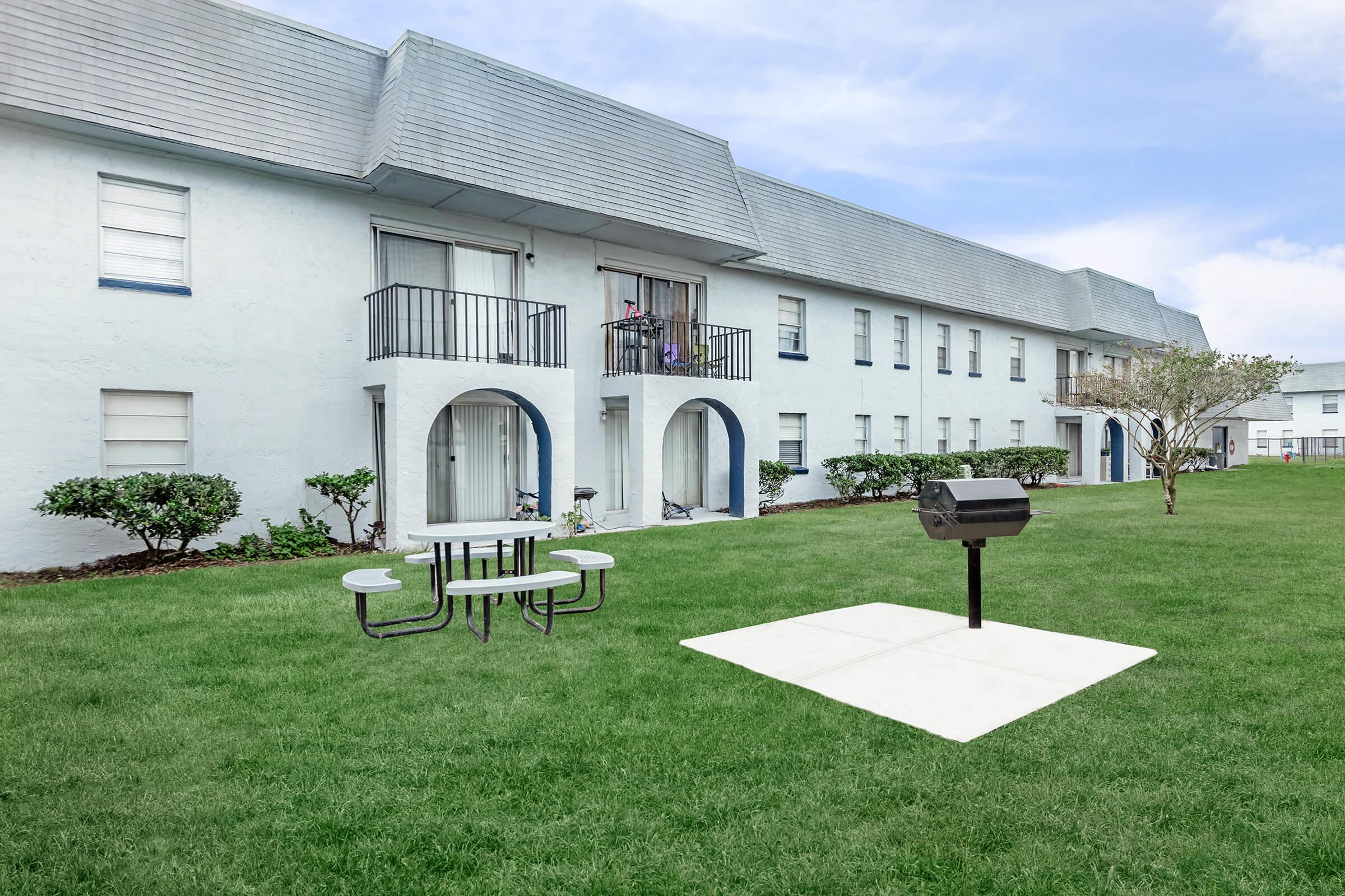 a large lawn in front of a house