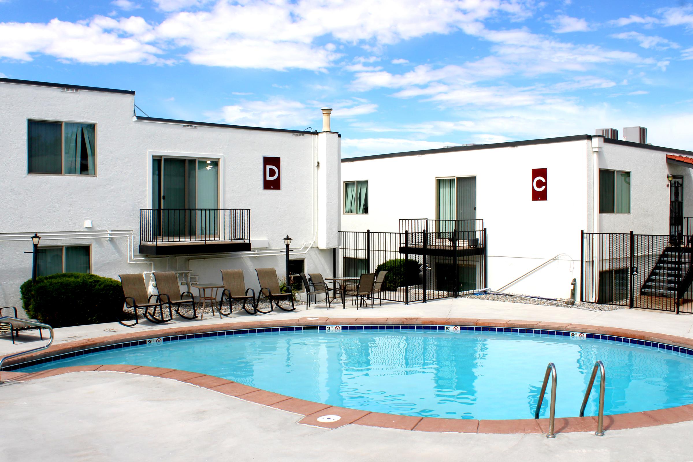 a large pool of water in front of a building