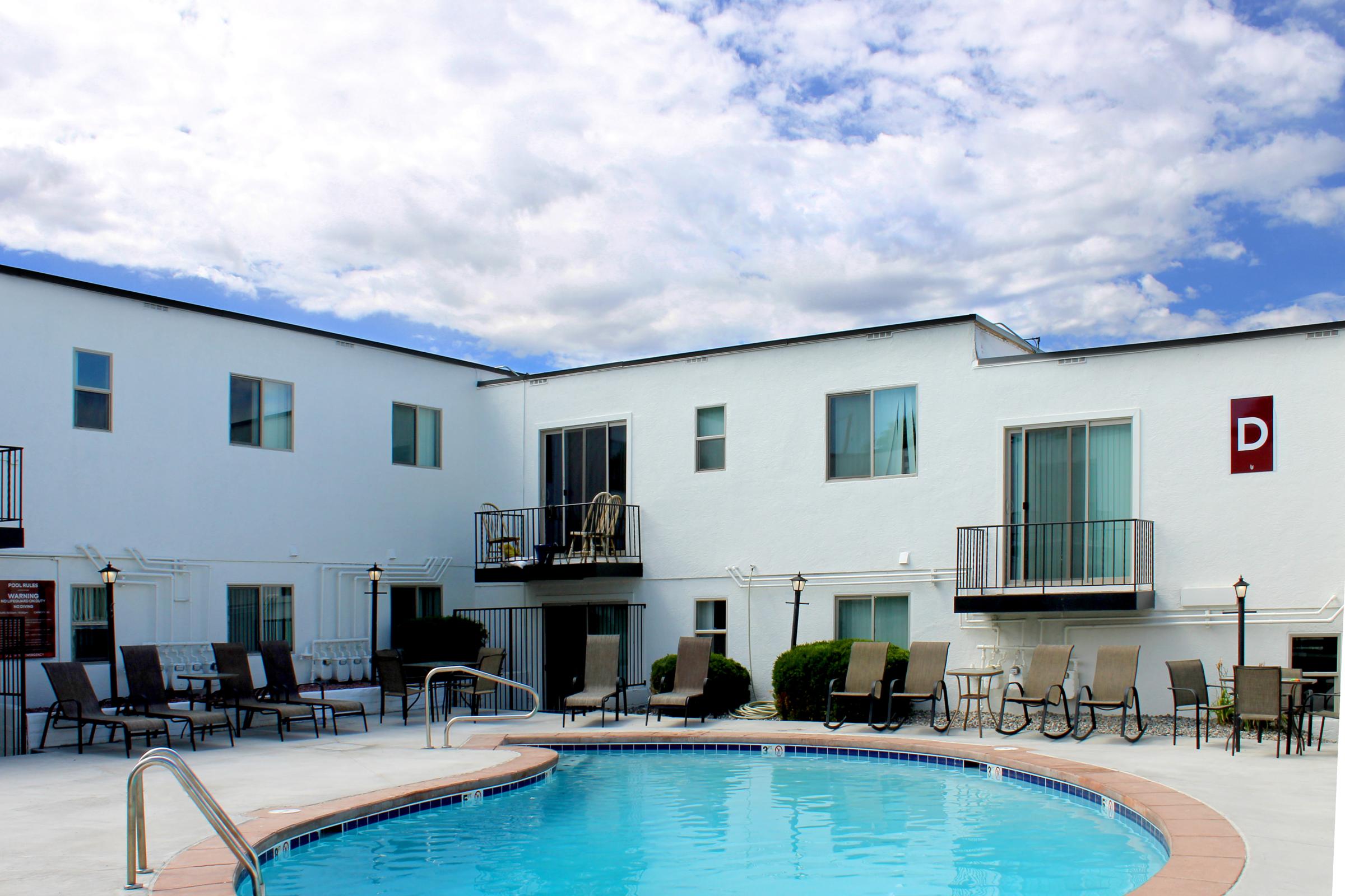 a large pool of water in front of a building