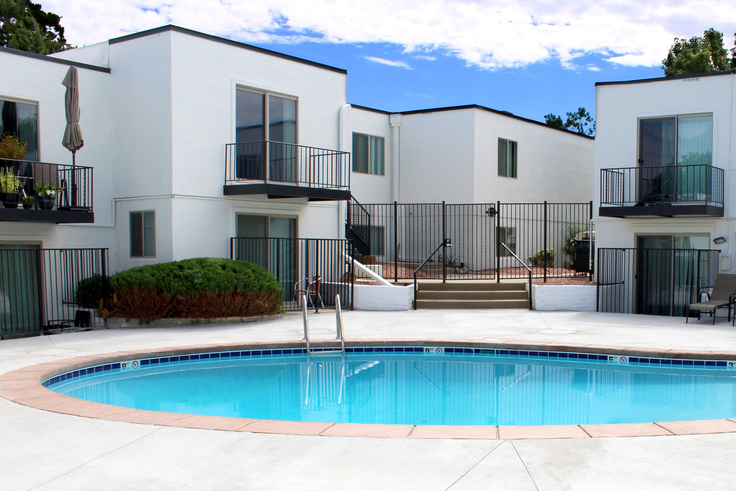 a pool next to a building