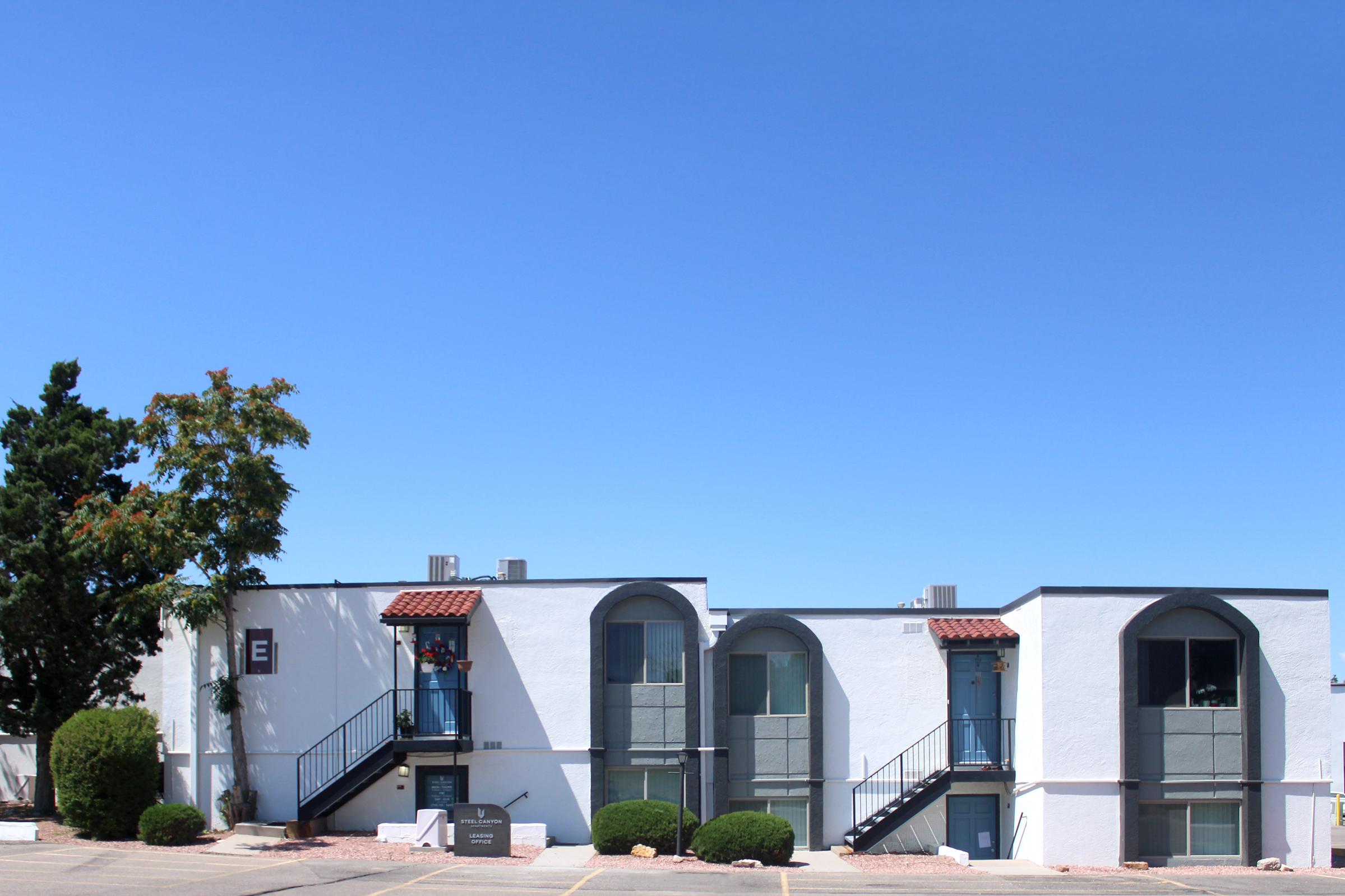 a house that is parked on the side of a building