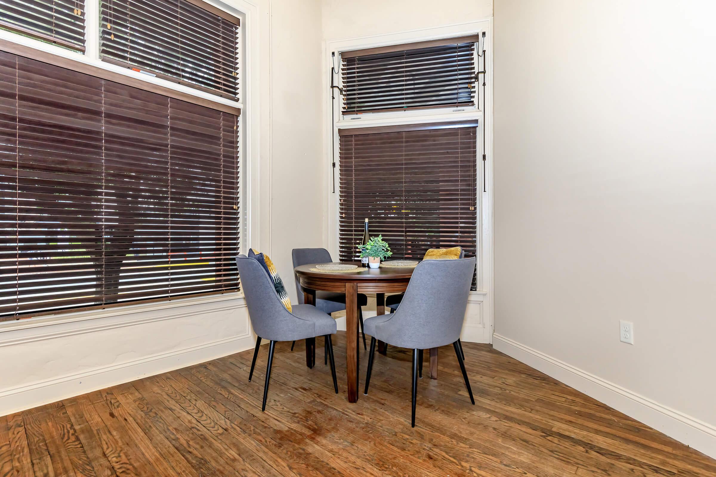 a chair sitting in front of a window