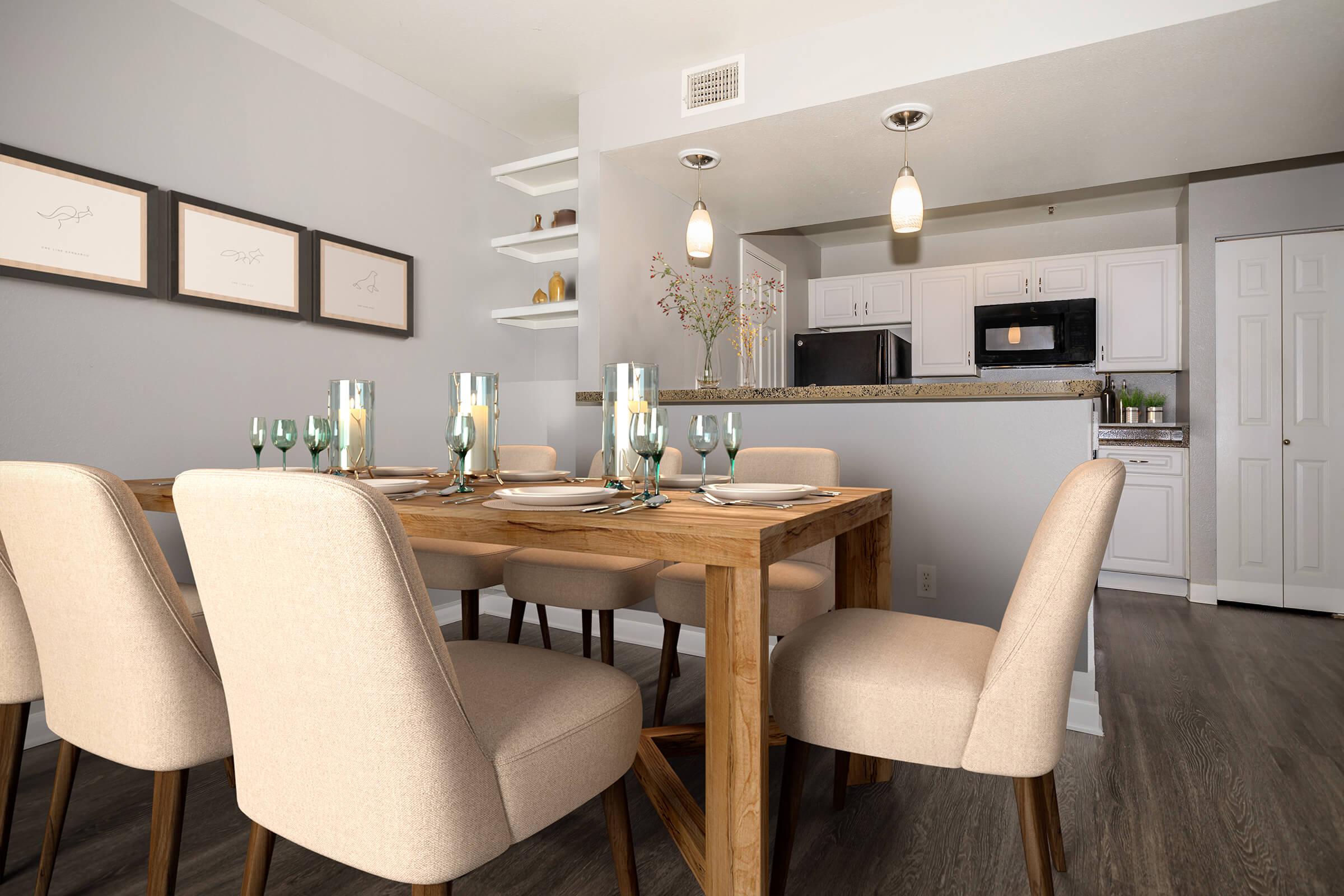 a kitchen with an island in the middle of a room