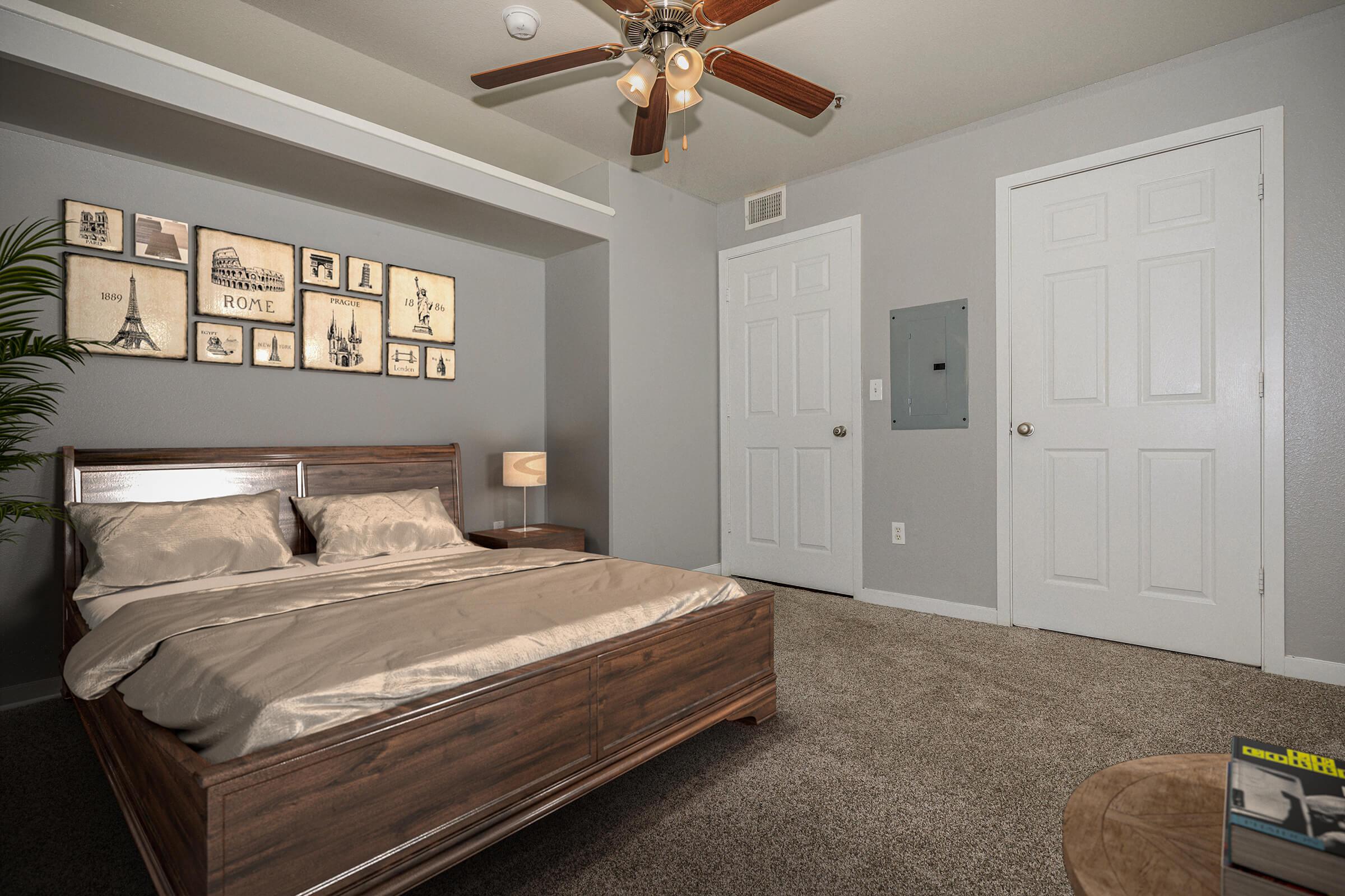 a bedroom with a bed in a room