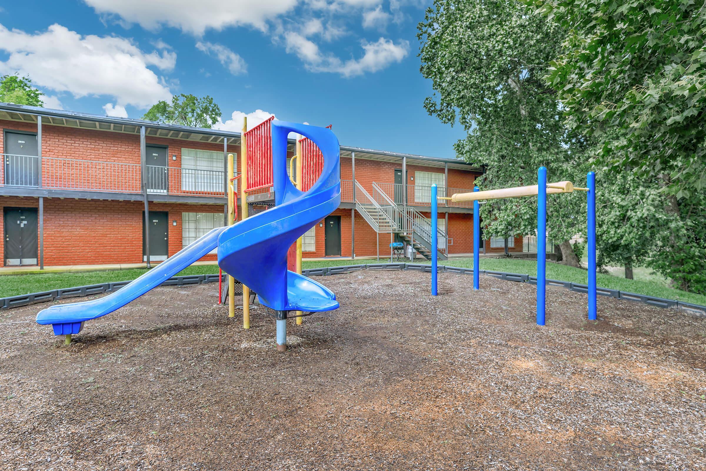 a playground in front of a building