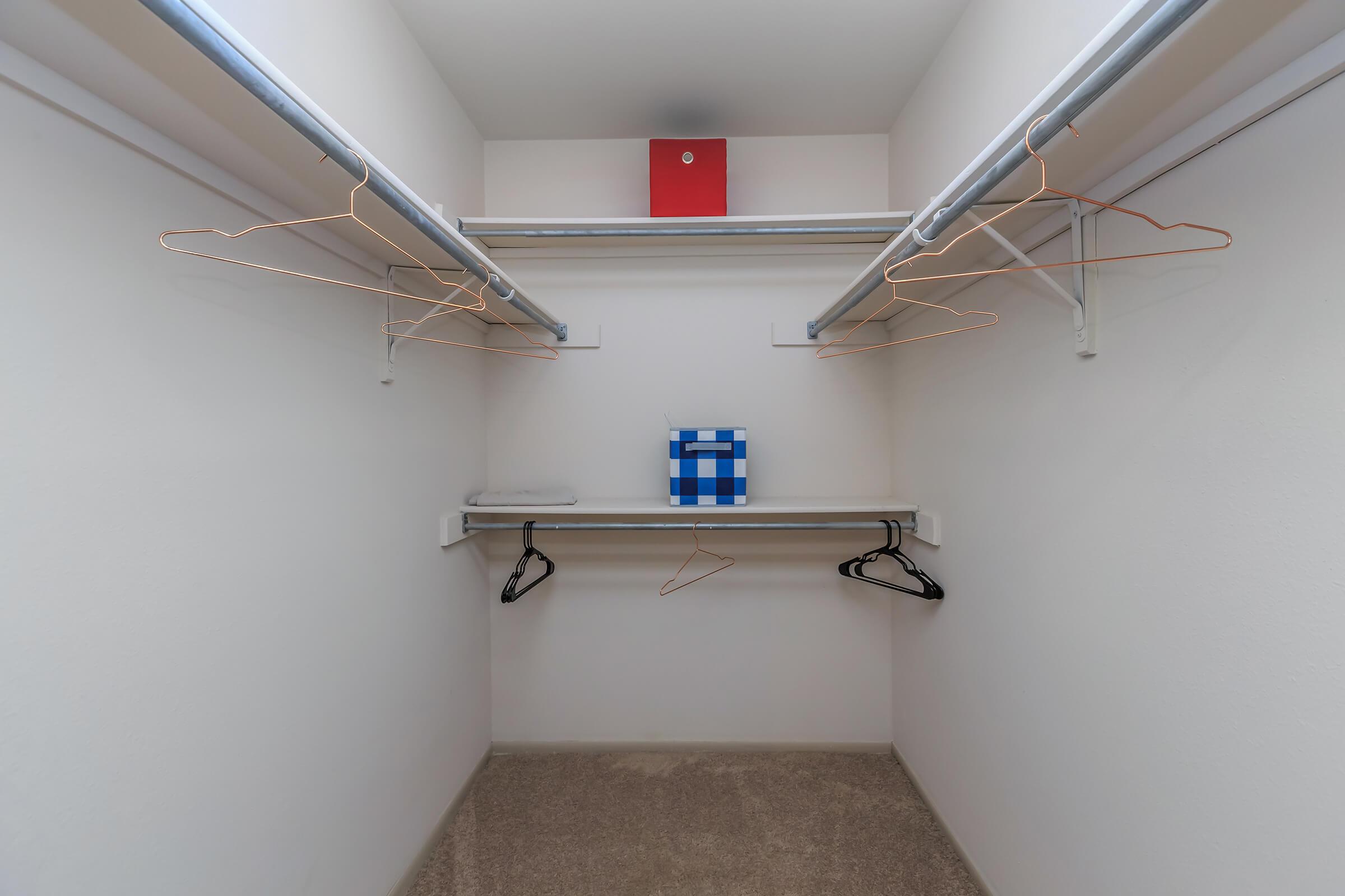 a white tub sitting next to a shower