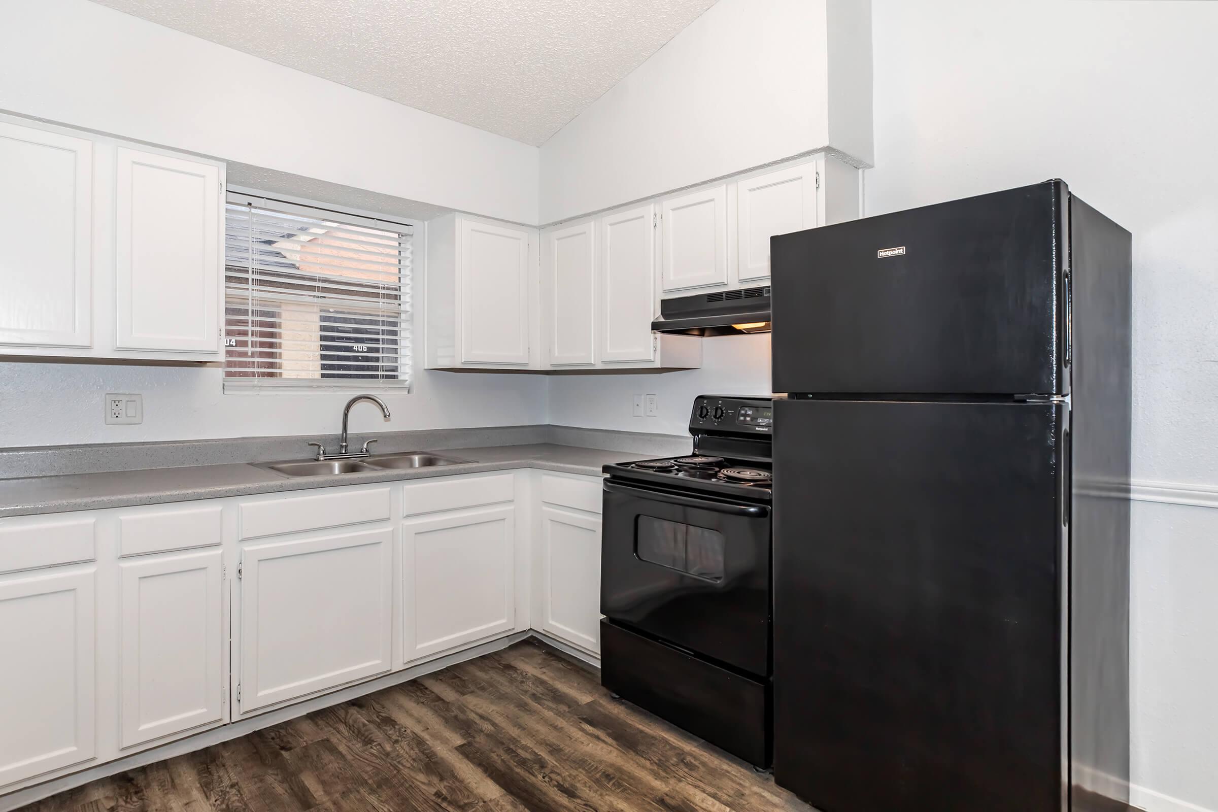 a stainless steel refrigerator in a kitchen