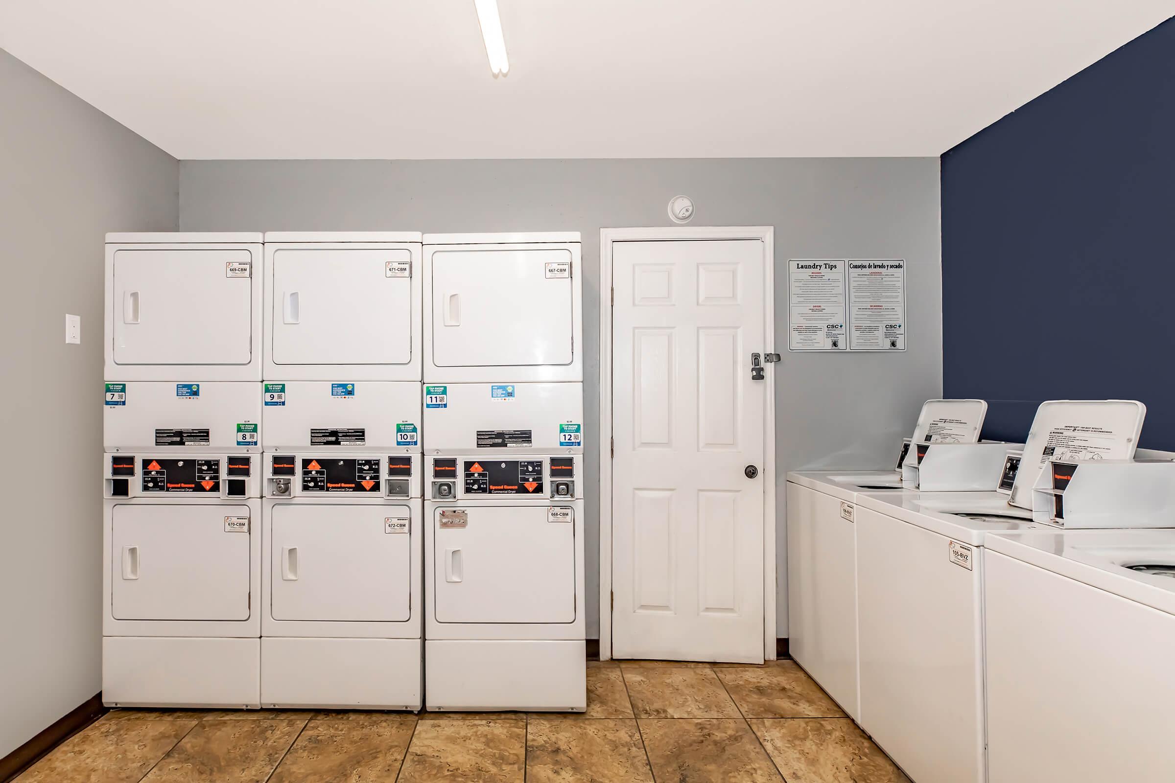 a kitchen with a stove and a refrigerator