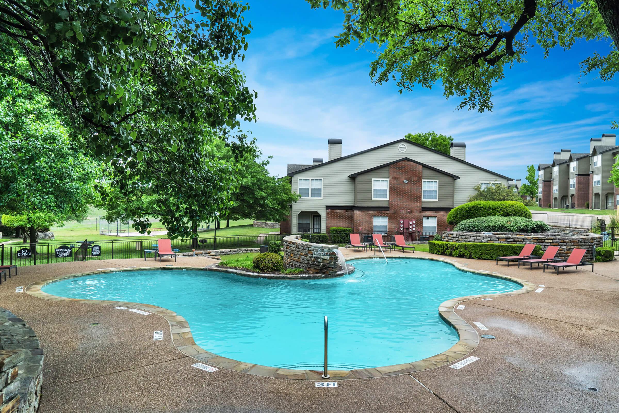 a pool next to a body of water