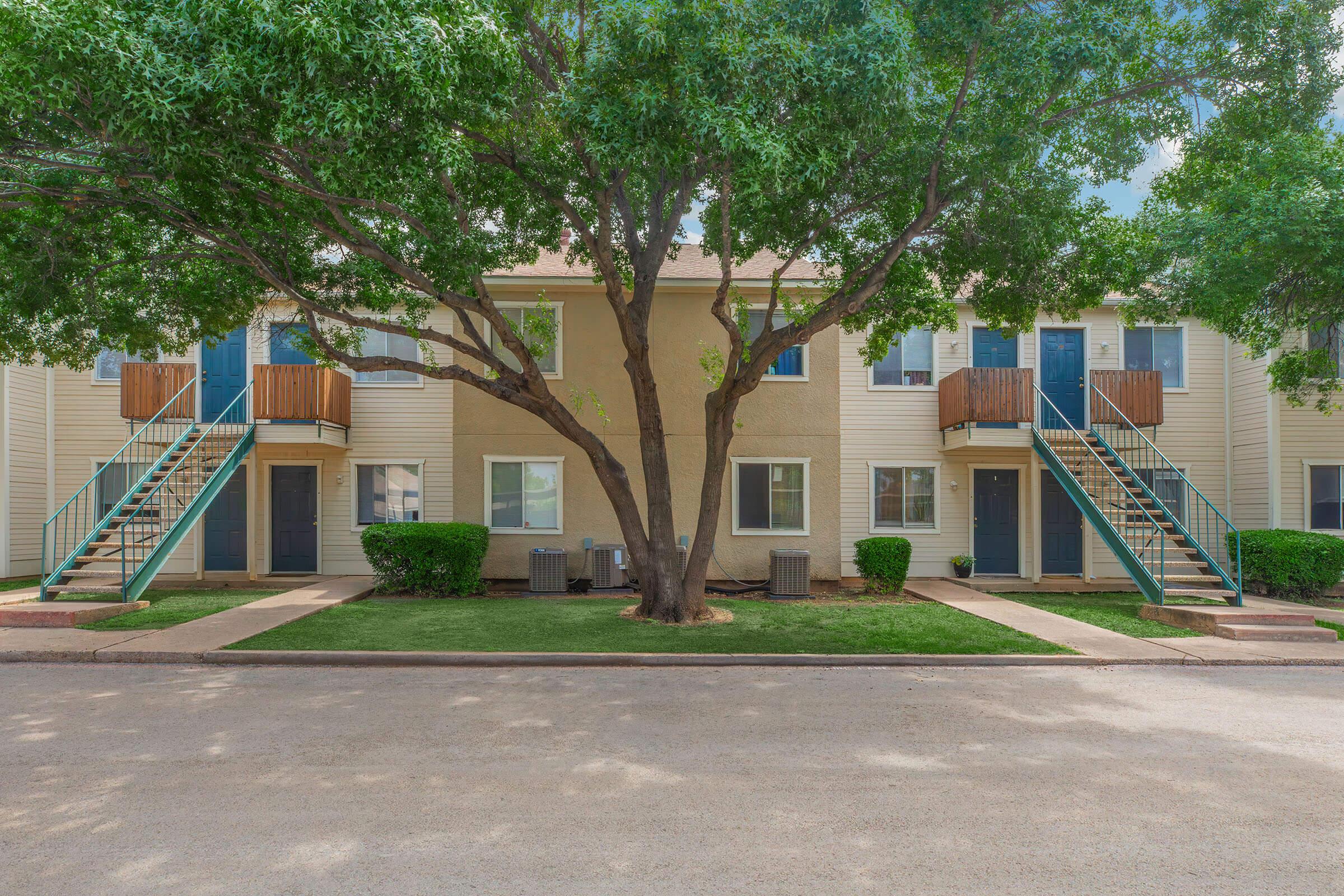 a tree in front of a building