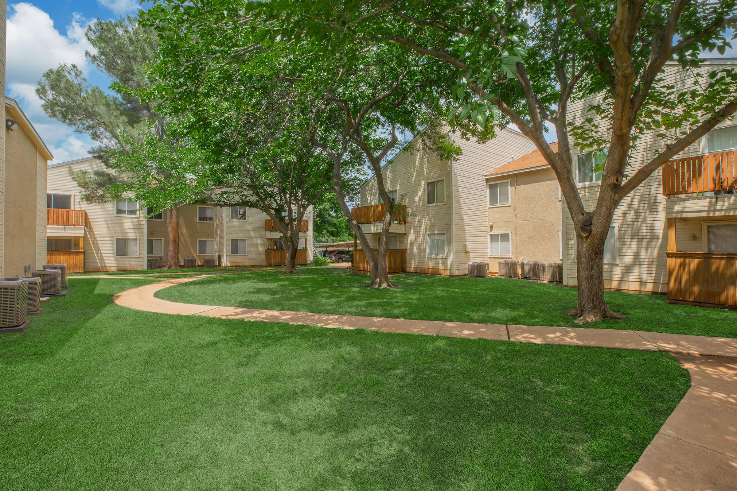 a large lawn in front of a house