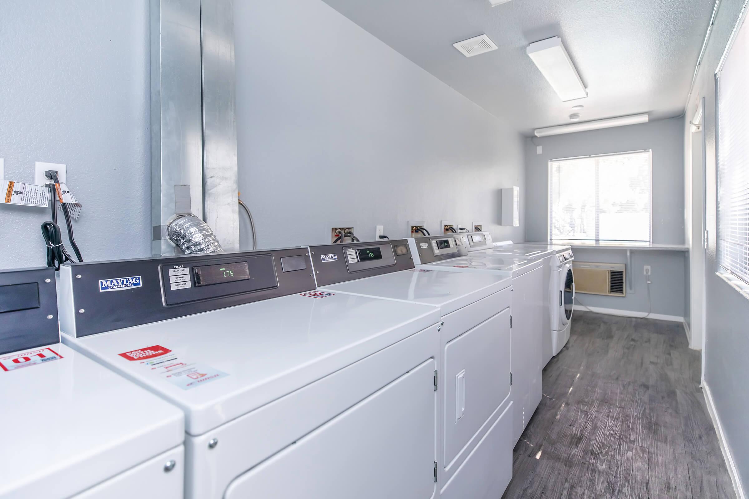 a kitchen with a sink and a microwave