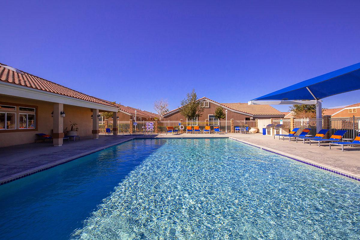 a pool next to a body of water