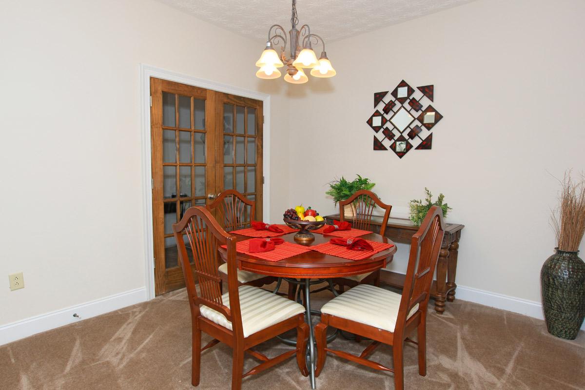 a large red chair in a room