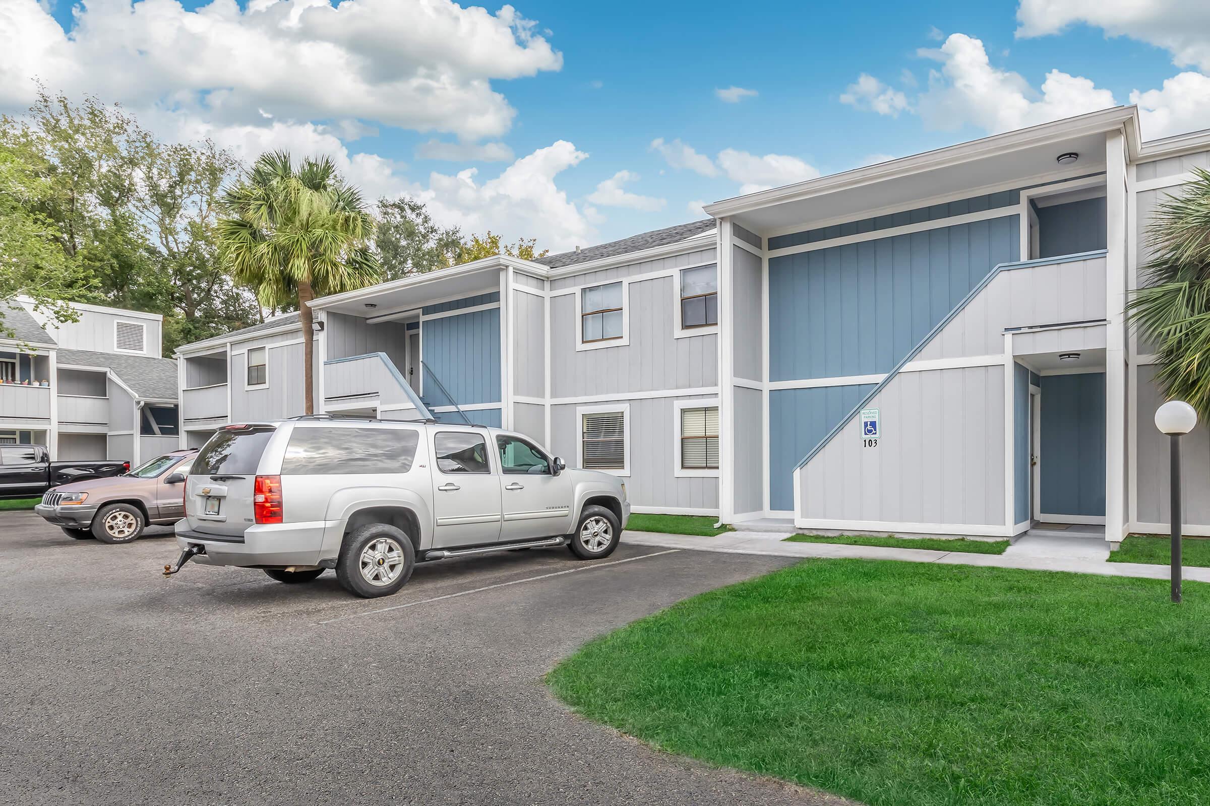 a truck is parked in front of a house