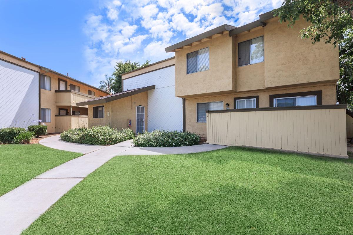 a large lawn in front of a house