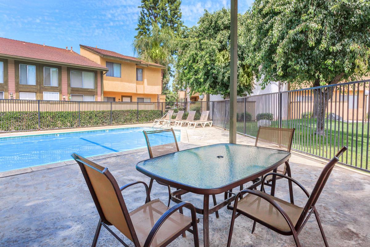 a chair sitting in front of a pool