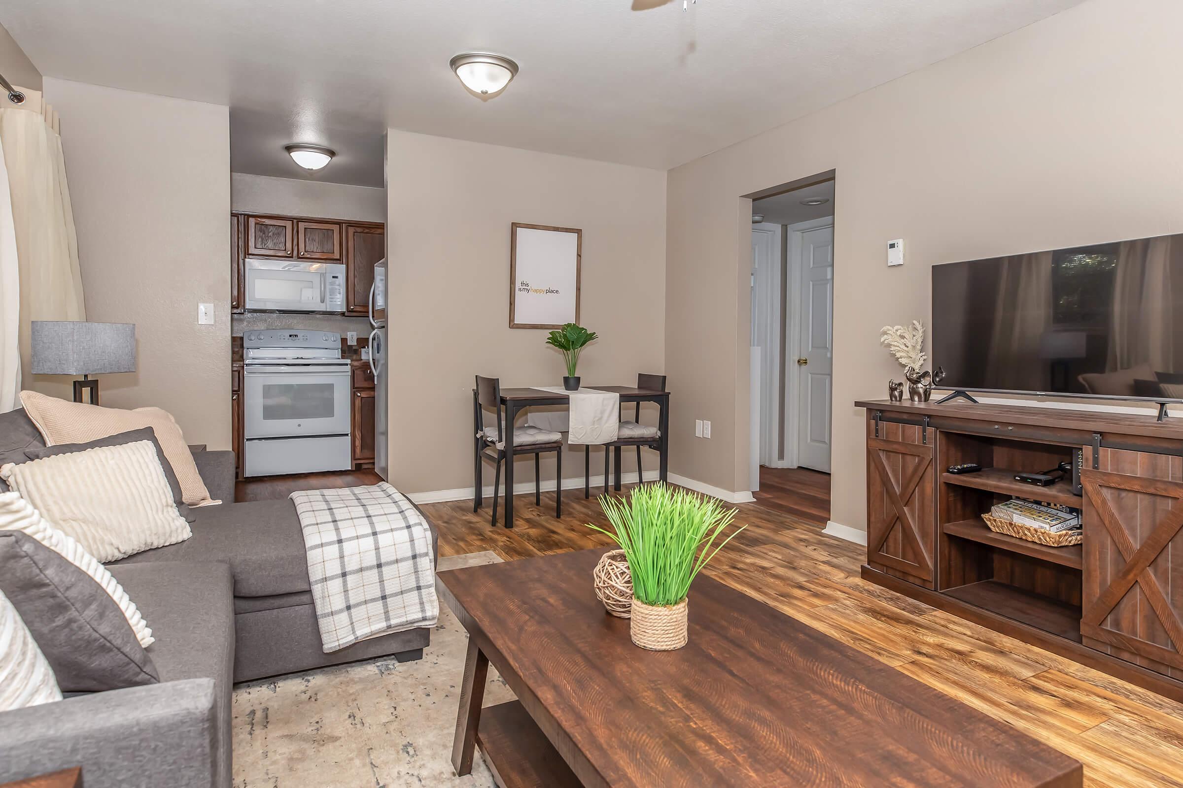 a living room filled with lots of furniture