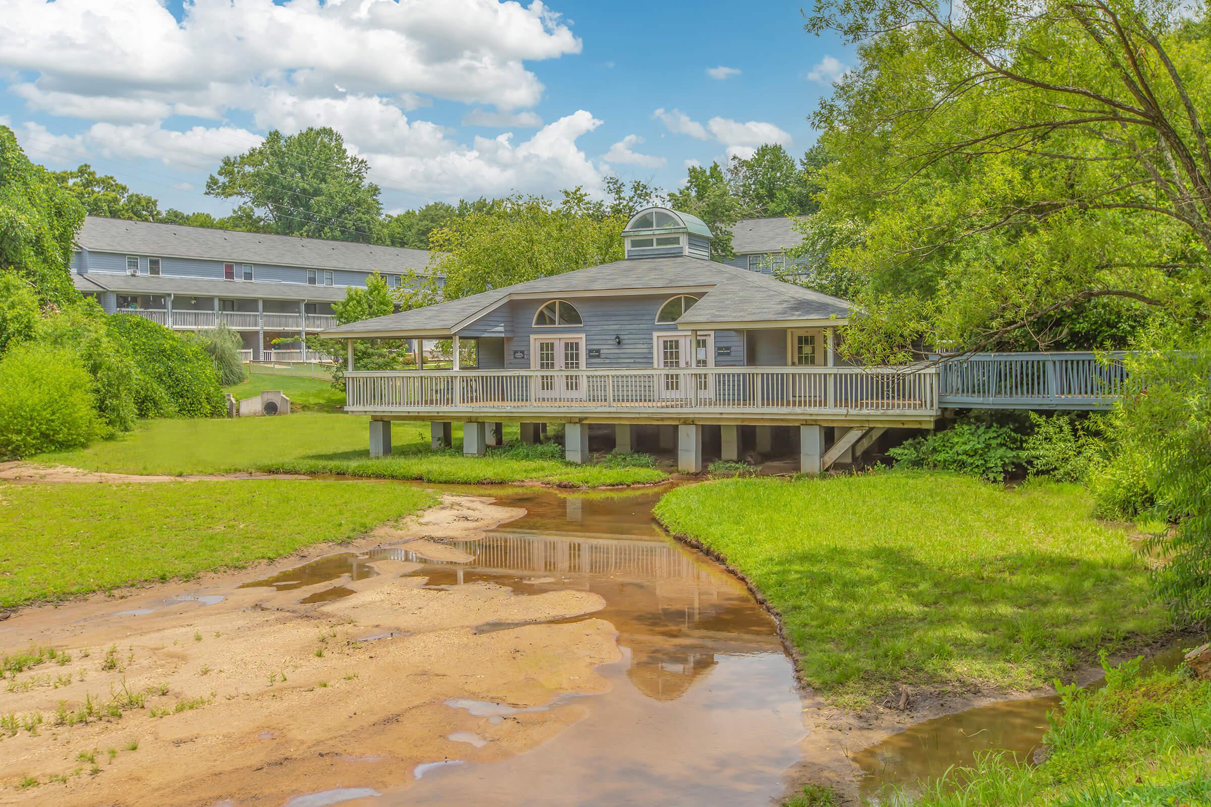 Stocked Pond and Designated Fishing Deck - Lakeside Place Apartments - Greenville - South Carolina