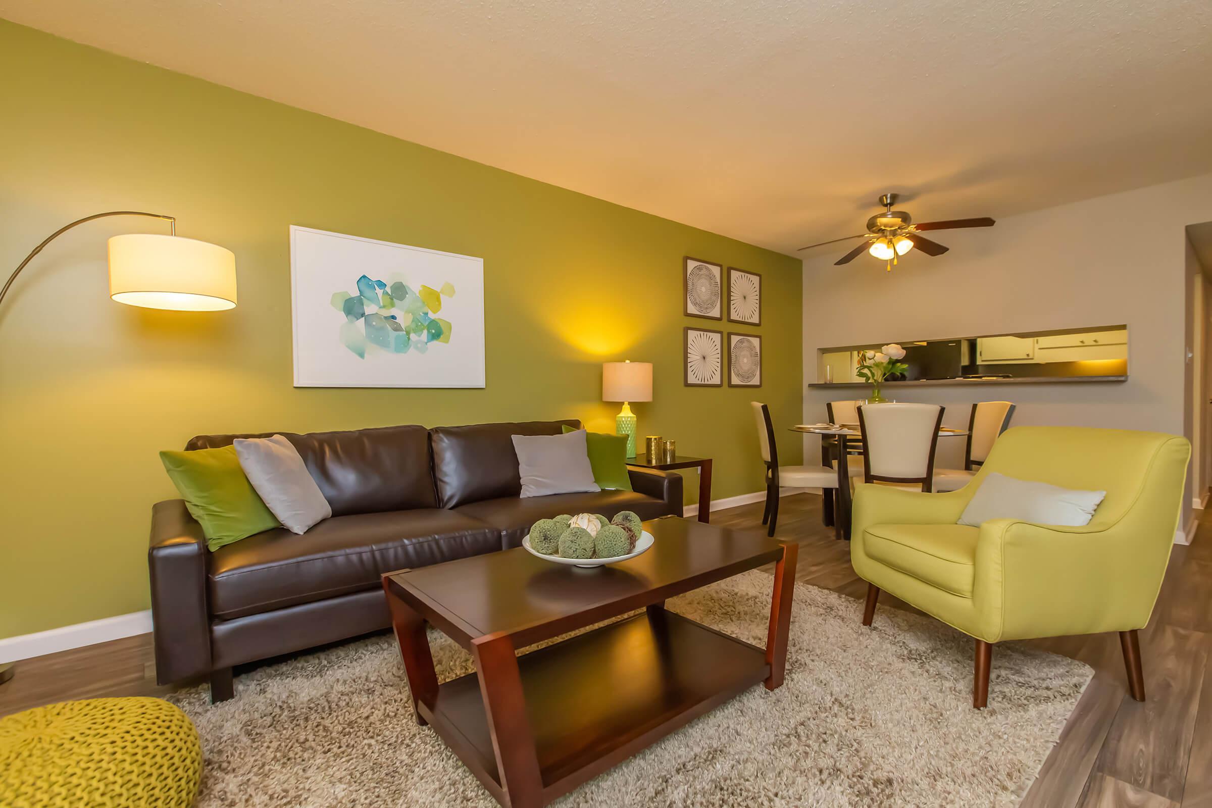 Living Space with Accent Wall - Lakeside Place Apartments - Greenville - South Carolina