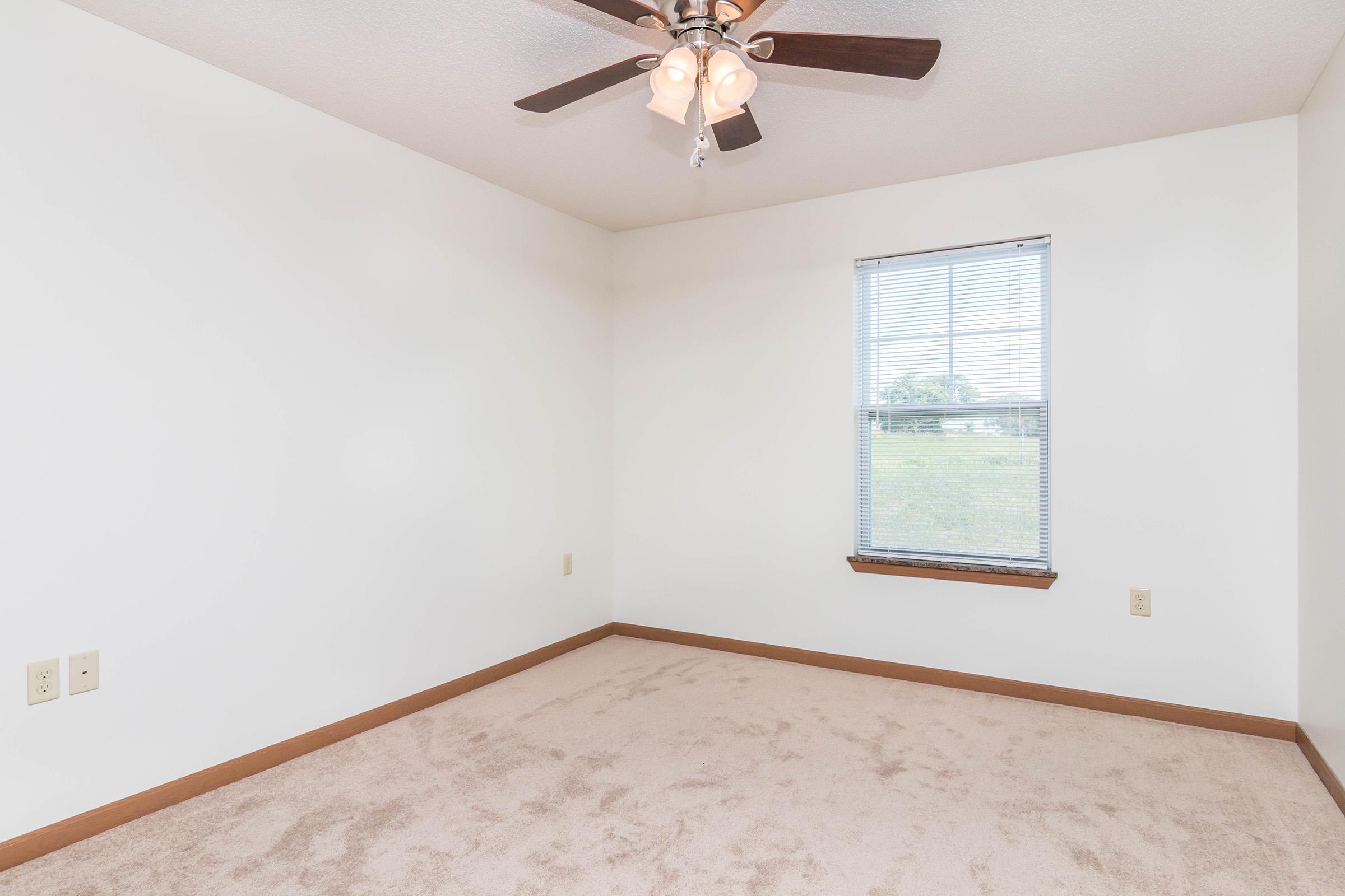 a room with a sink and a window