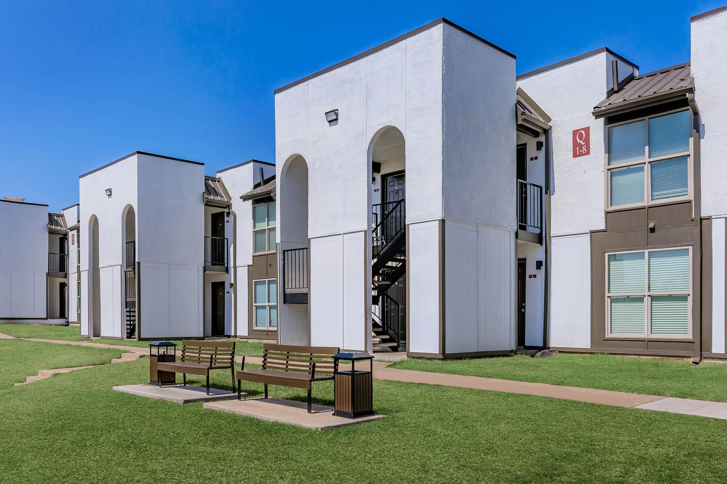 a large lawn in front of a building