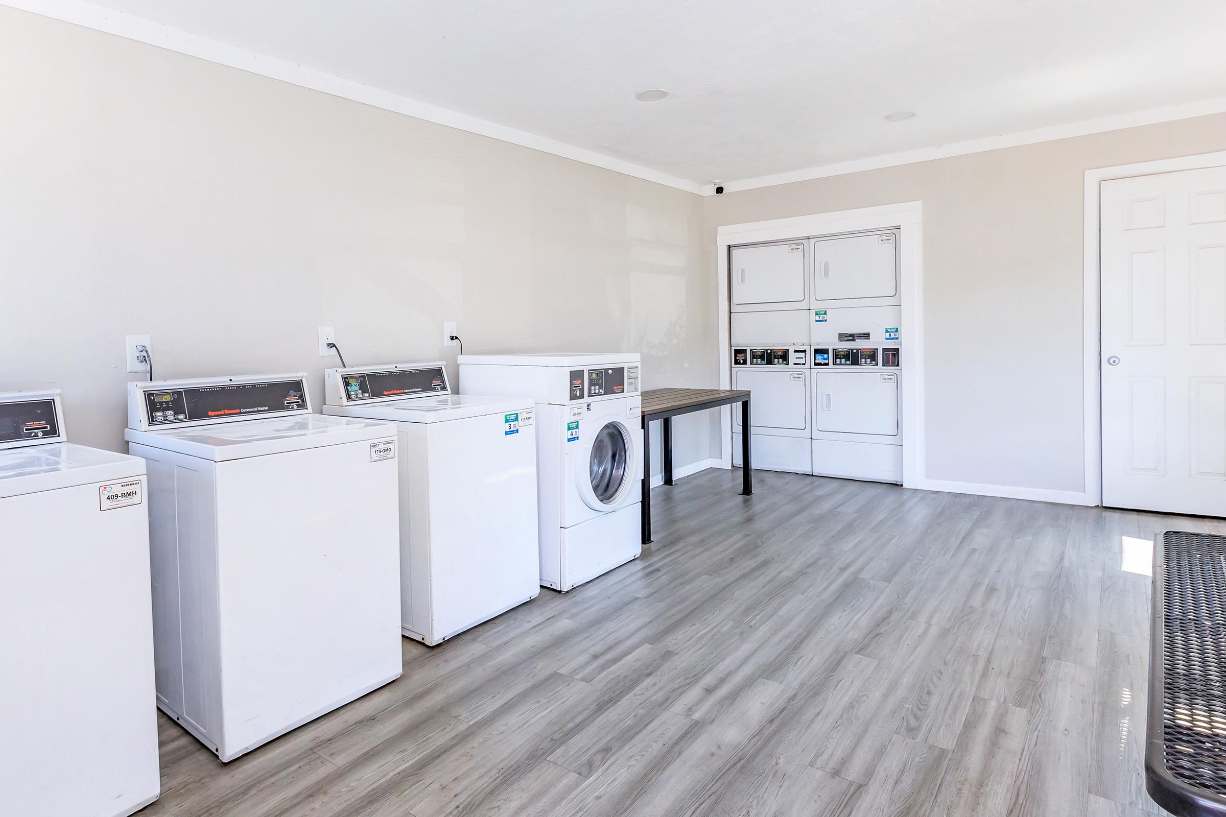 a kitchen with a stove and a refrigerator