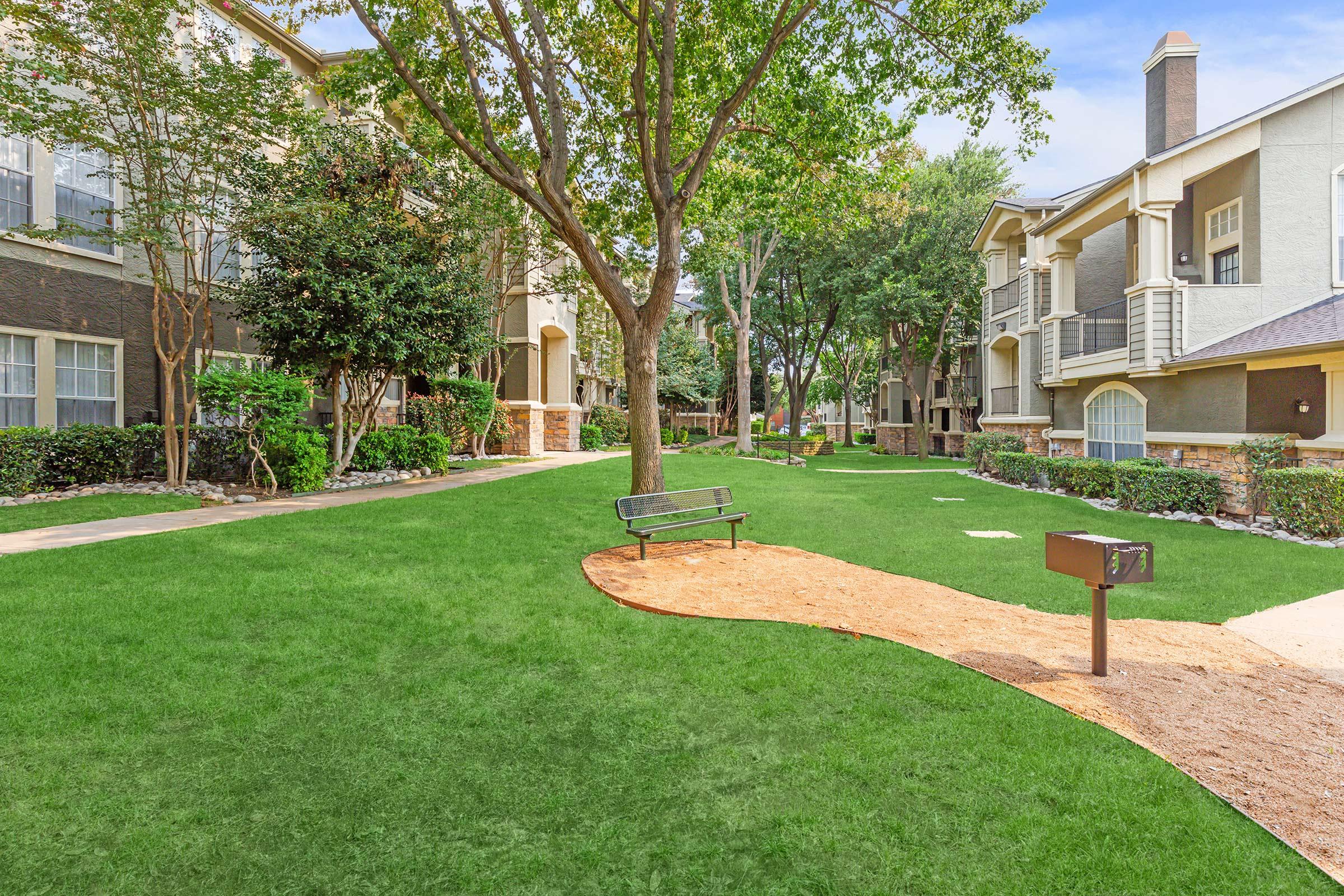 Stone Ridge courtyard with green trees