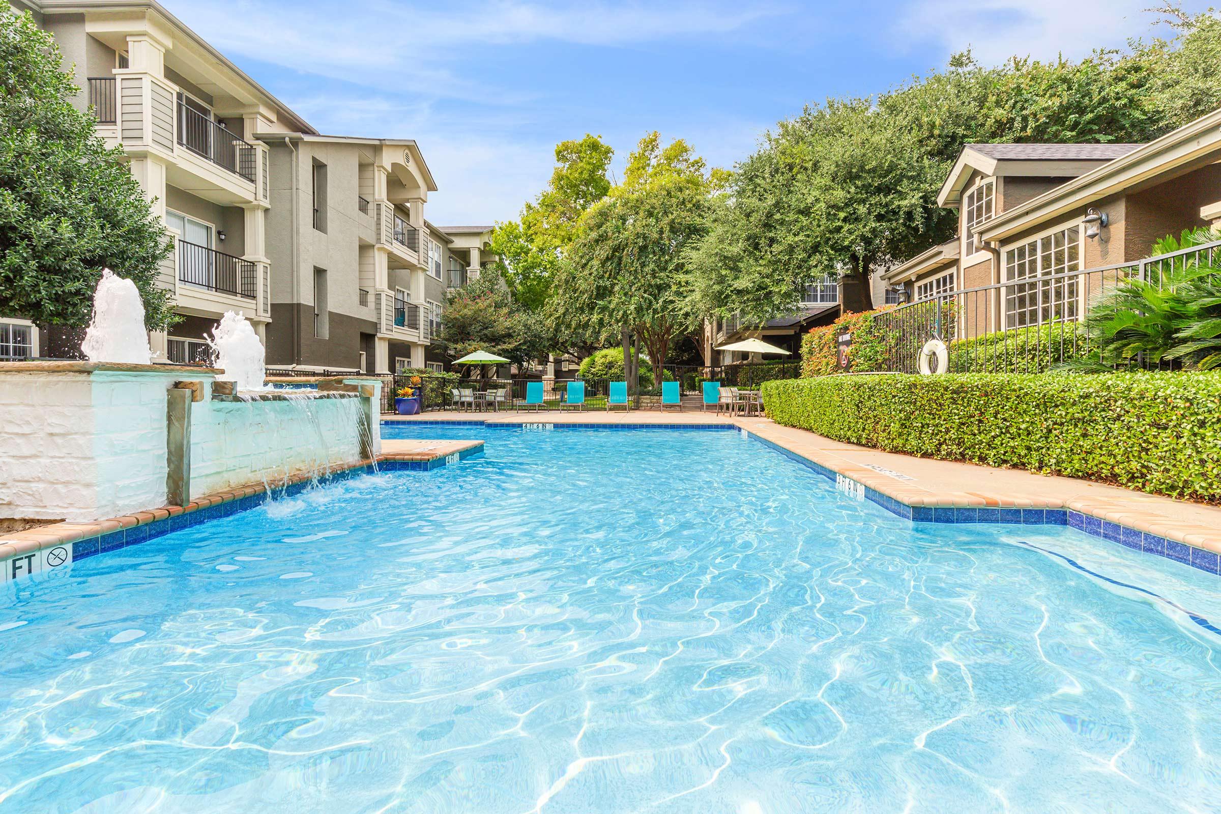 Stone Ridge community pool with water features