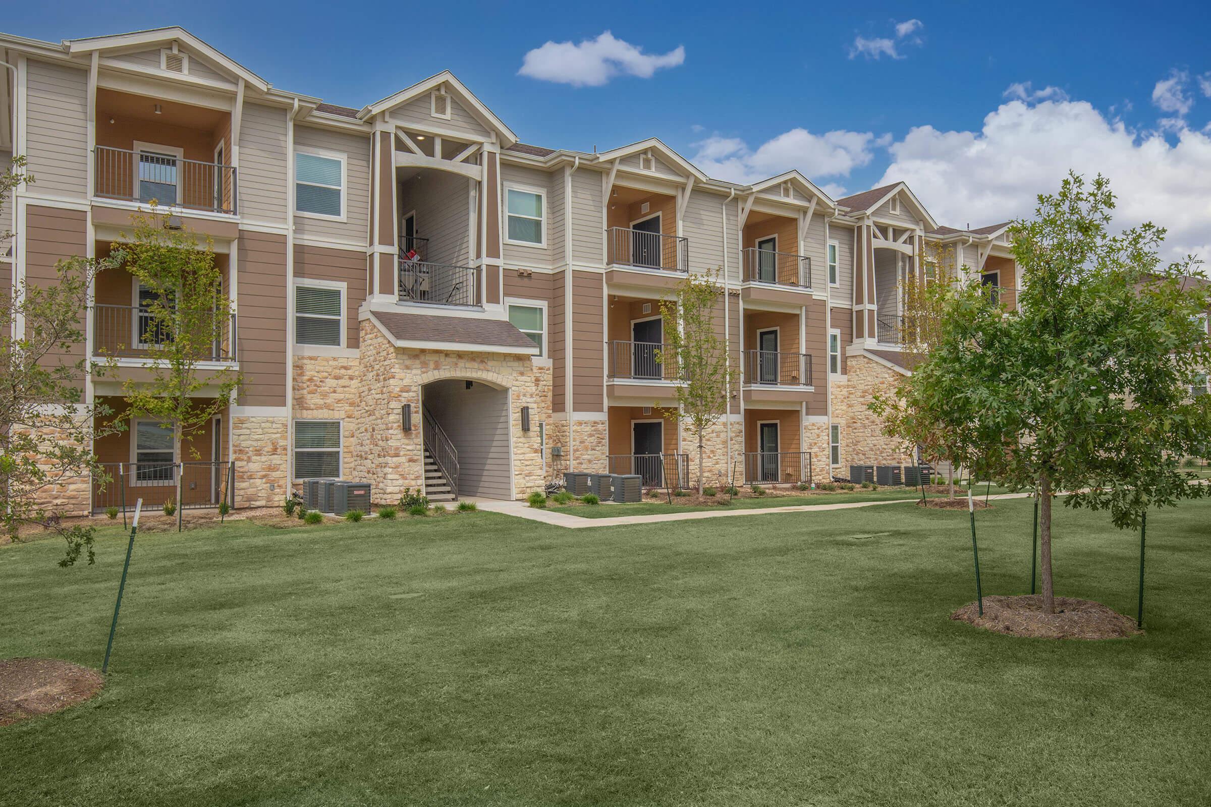 a large lawn in front of a house