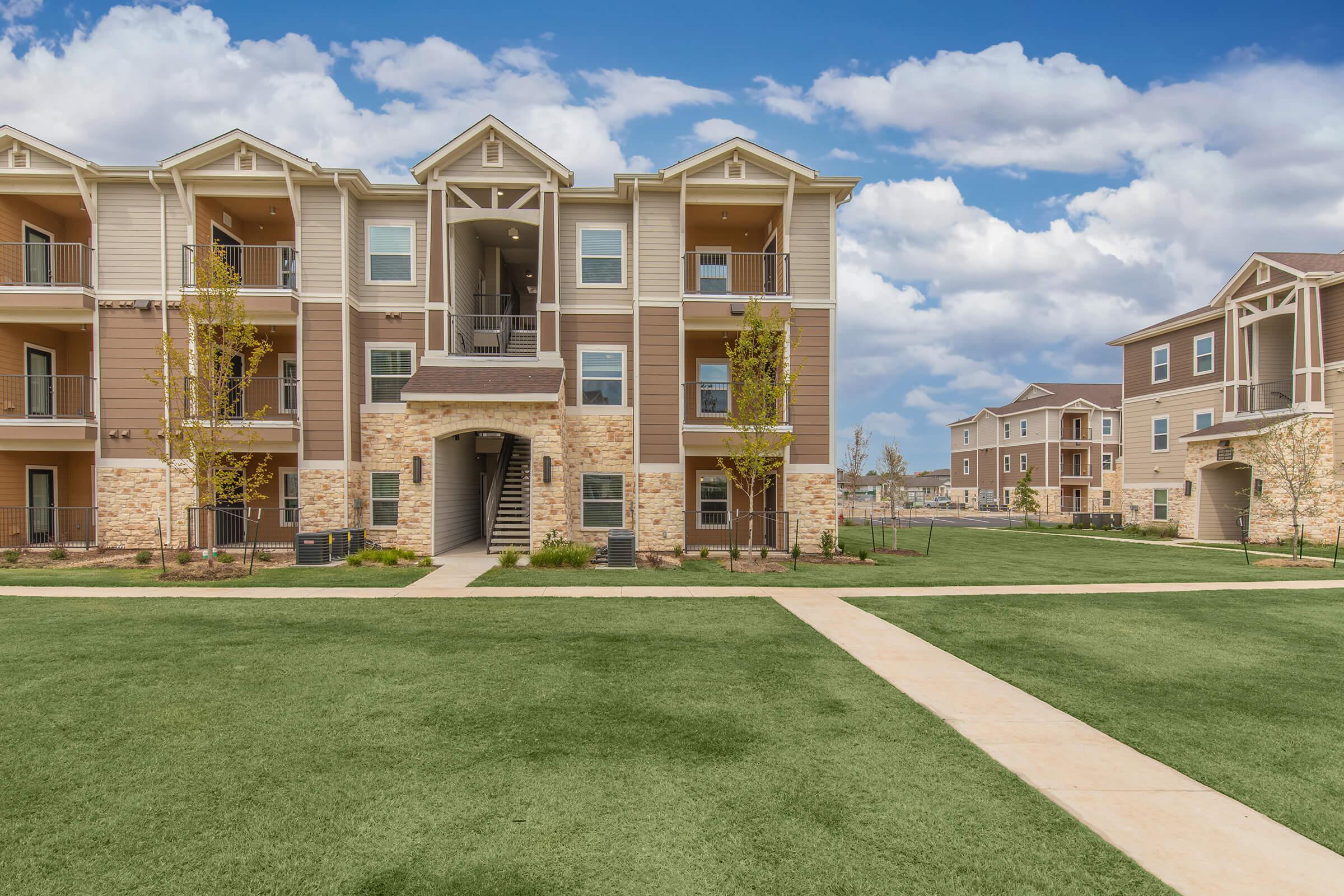 a large lawn in front of a house