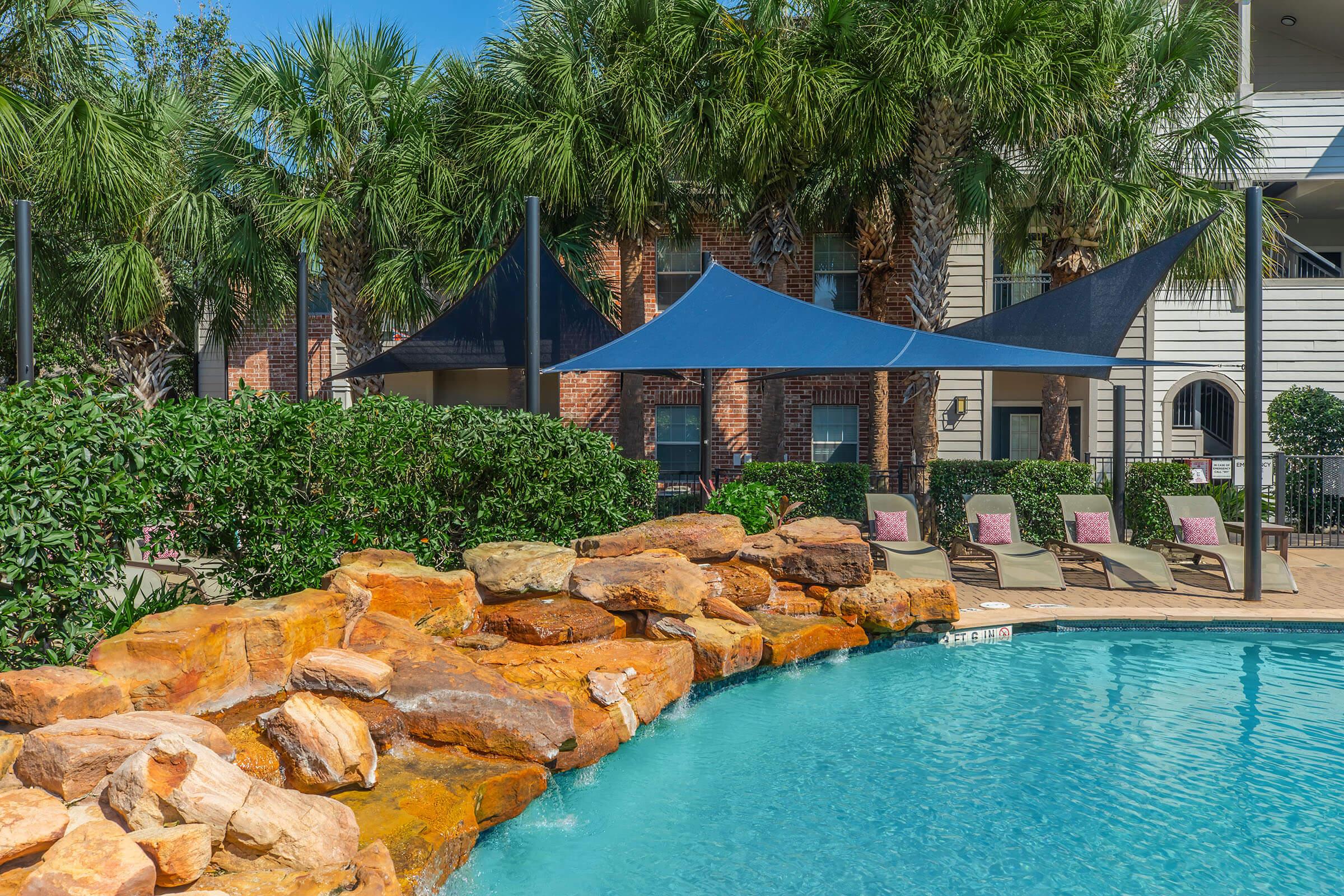 a house with a large pool of water