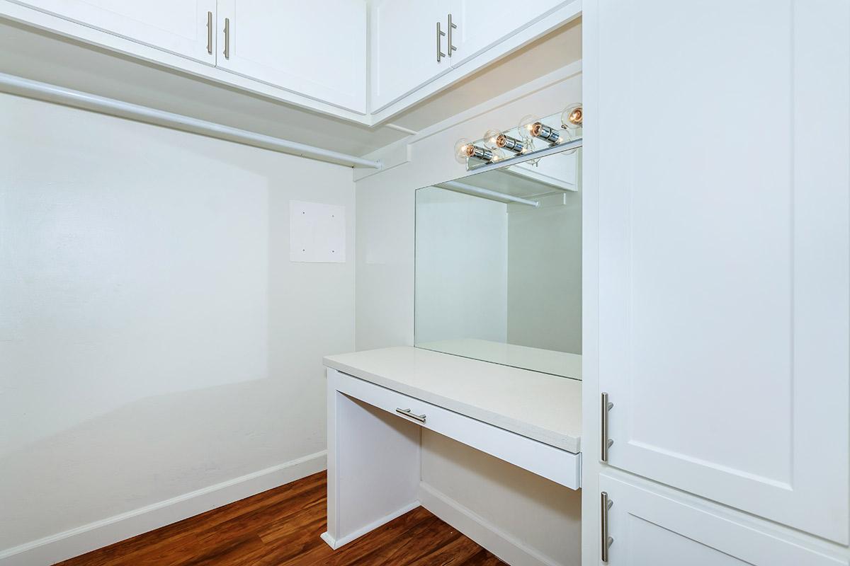 a white refrigerator freezer sitting in a room