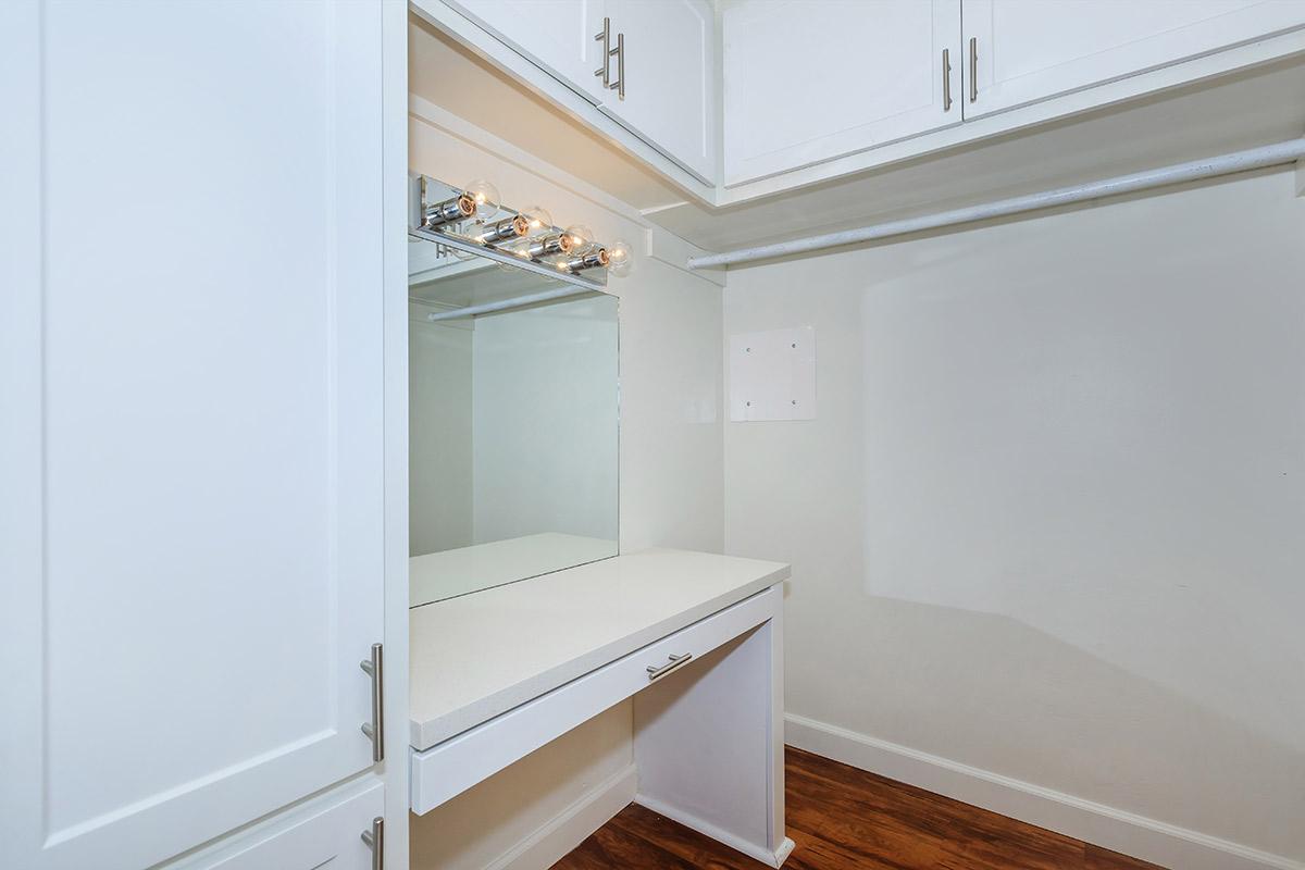 a white refrigerator freezer sitting in a room