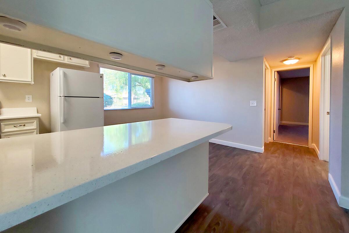 a kitchen with a sink and a window