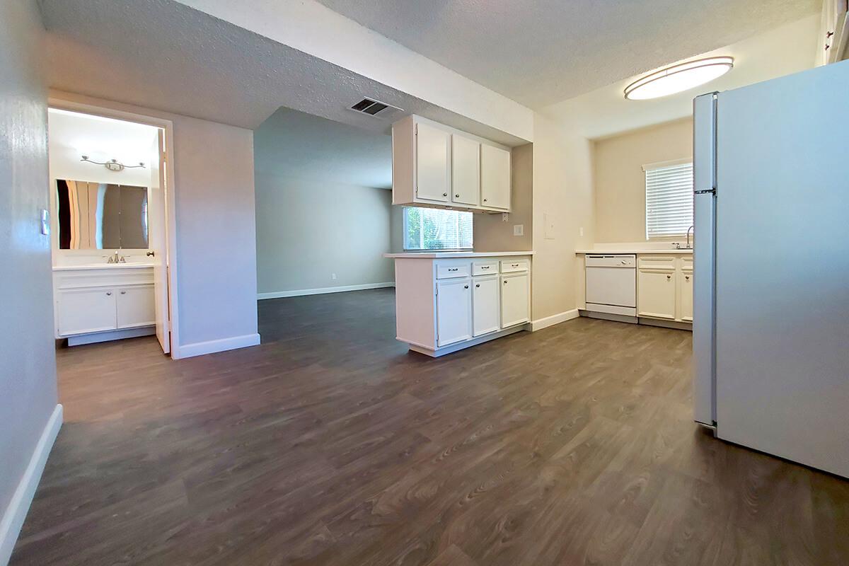 a kitchen with a wood floor