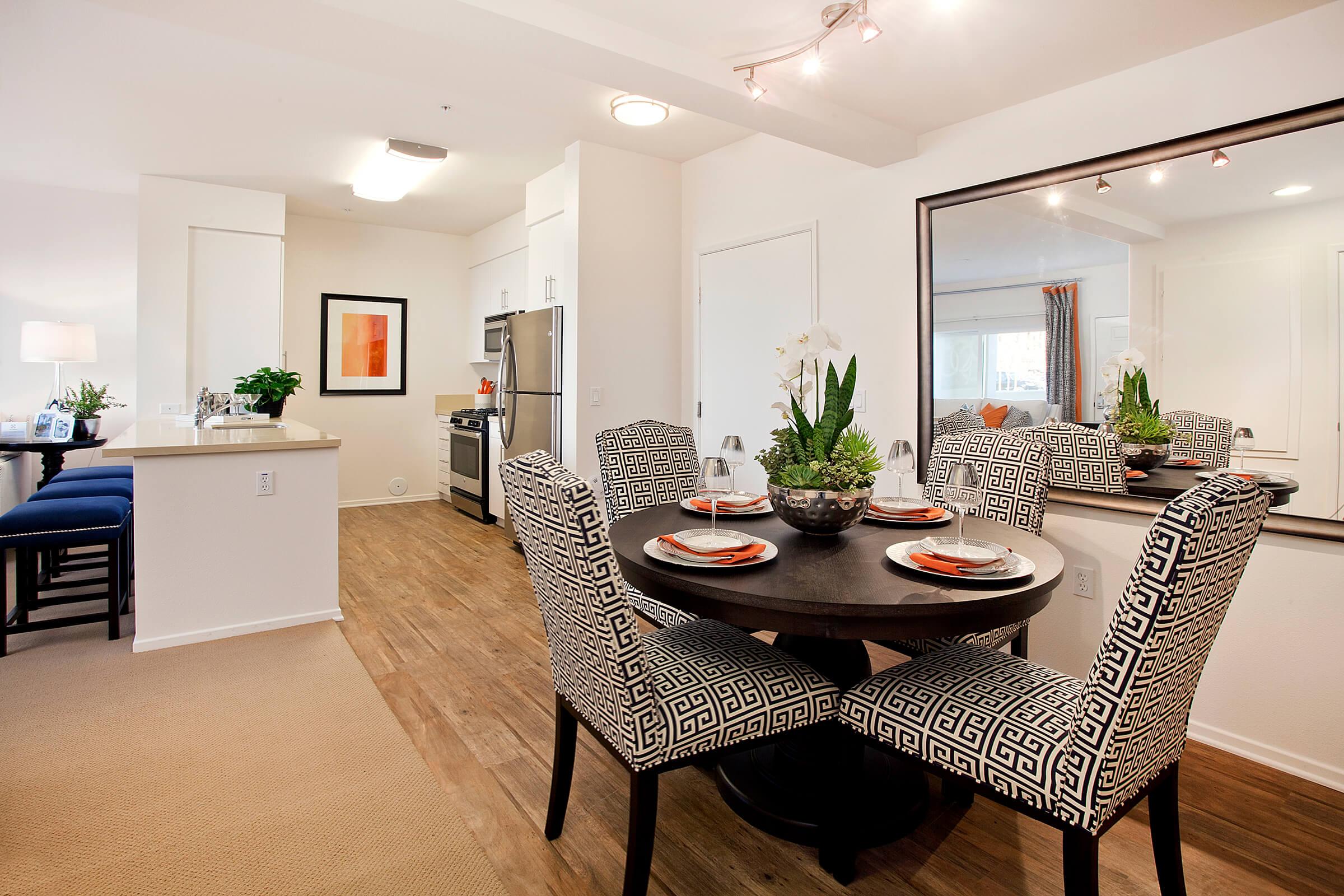 a dining room filled with furniture and a table