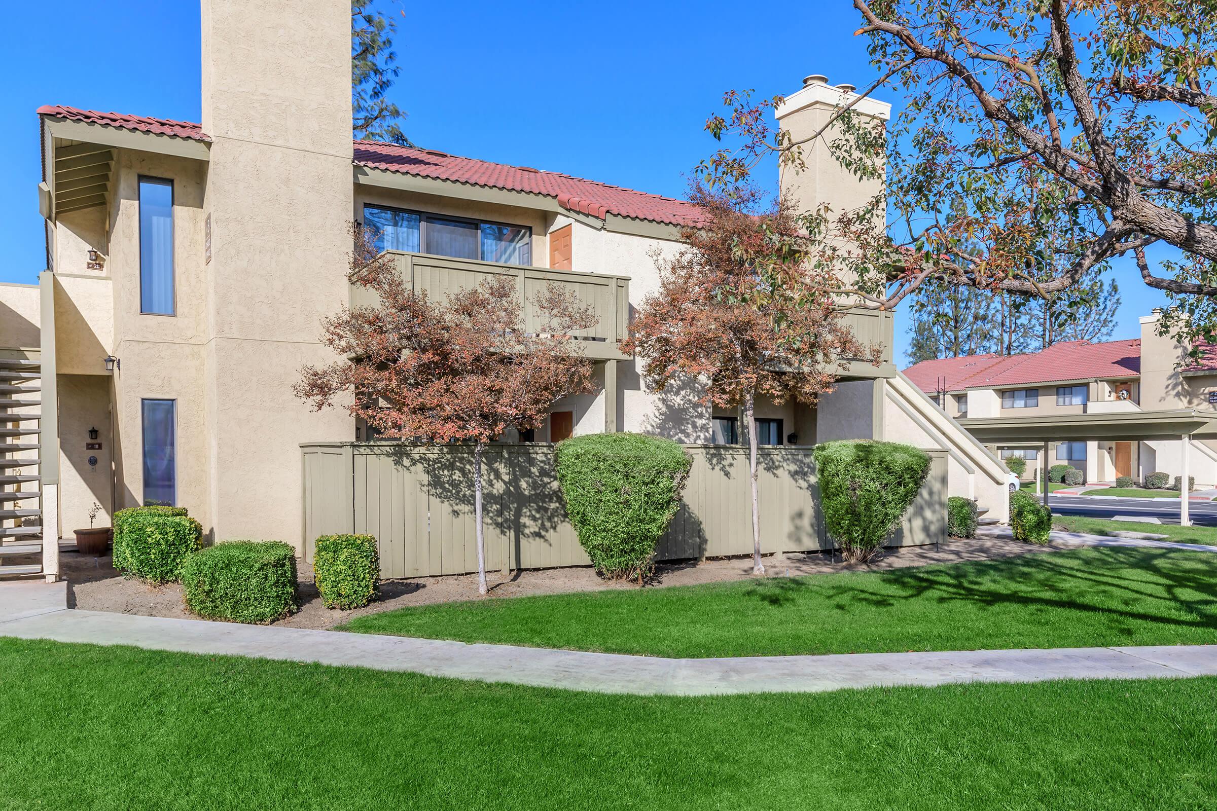 a large lawn in front of a house