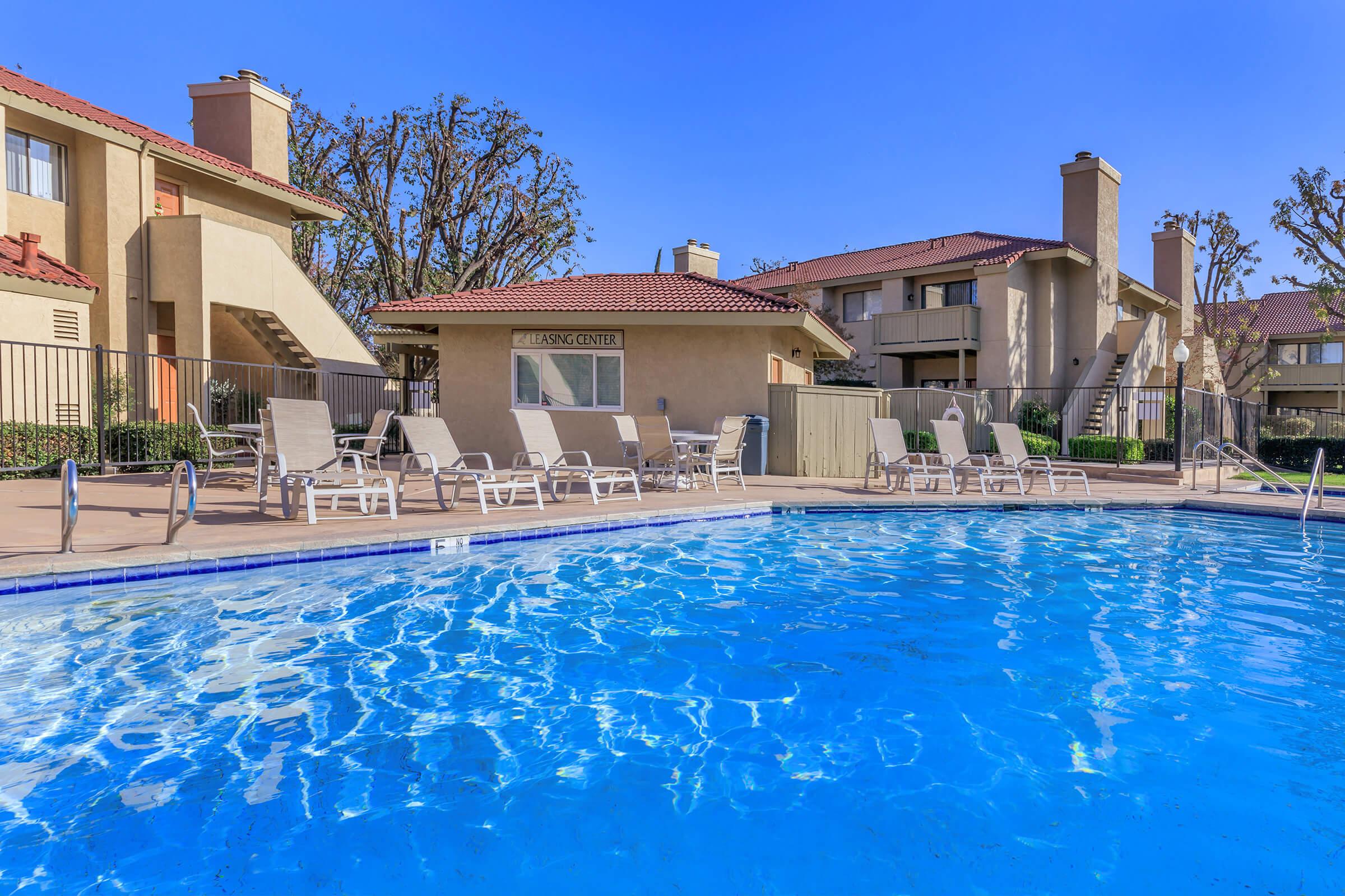 a house with a large pool of water