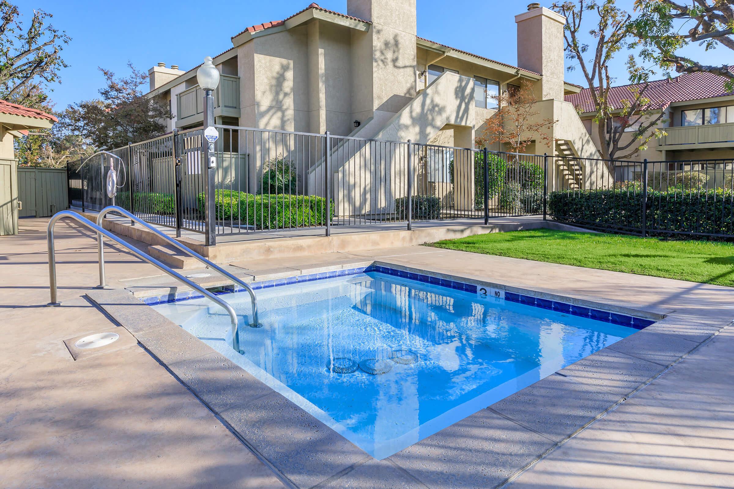 a pool next to a building