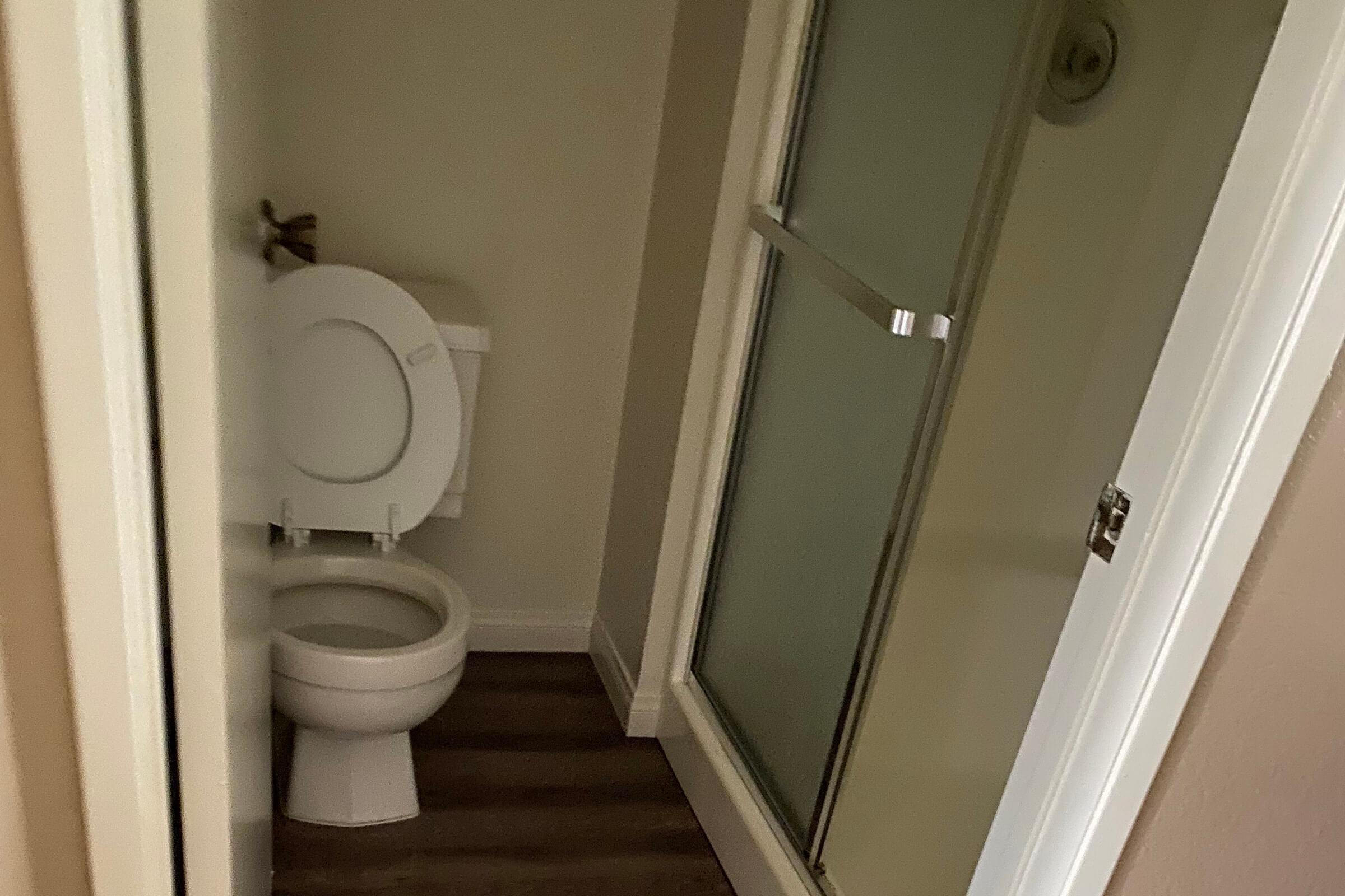 a white sink sitting next to a door