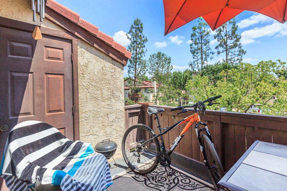 a bicycle with a umbrella