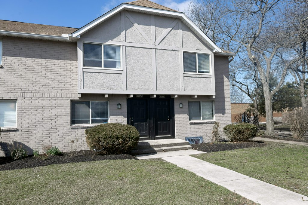 a large lawn in front of a house