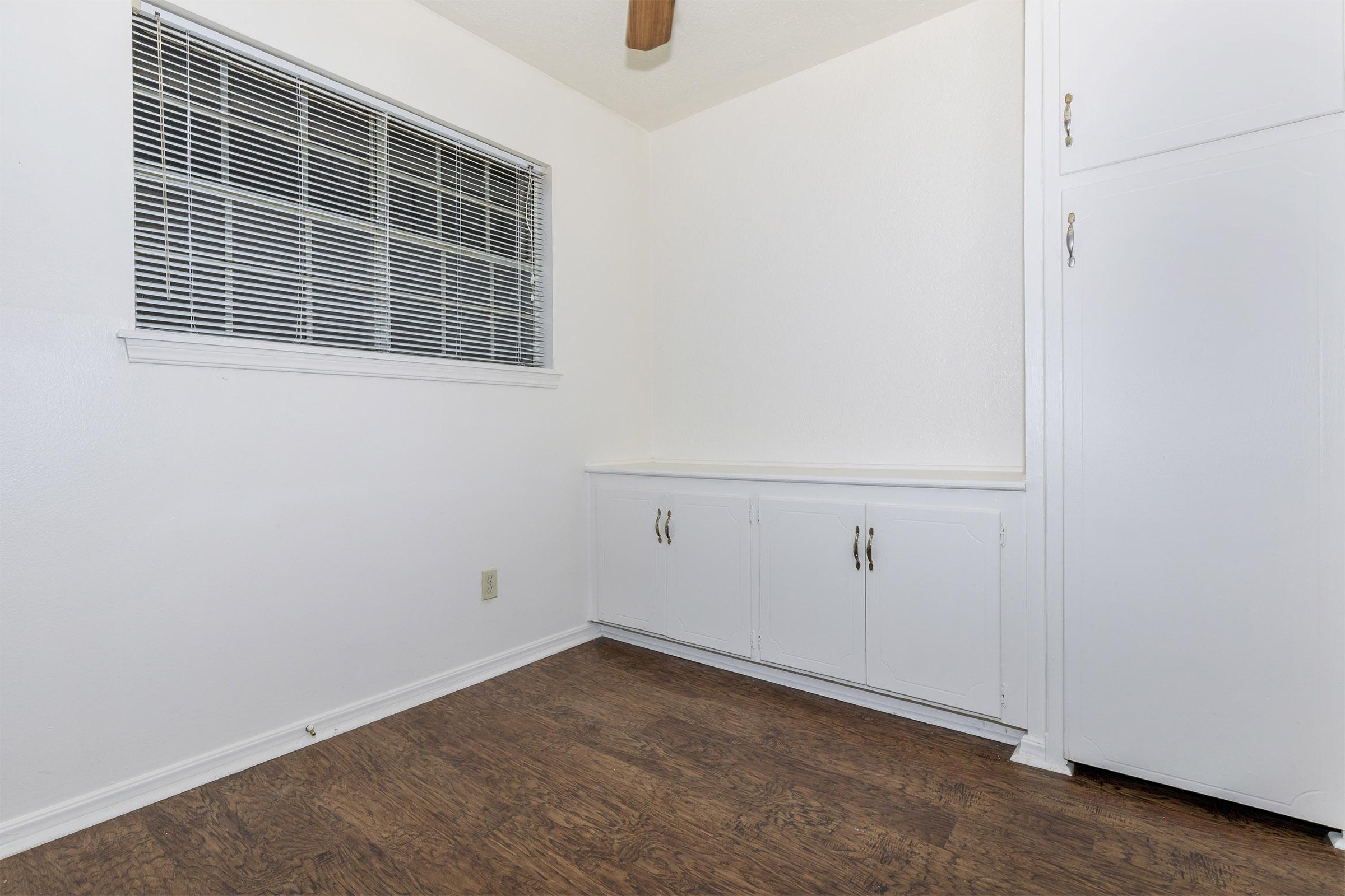 a white refrigerator freezer sitting in a room