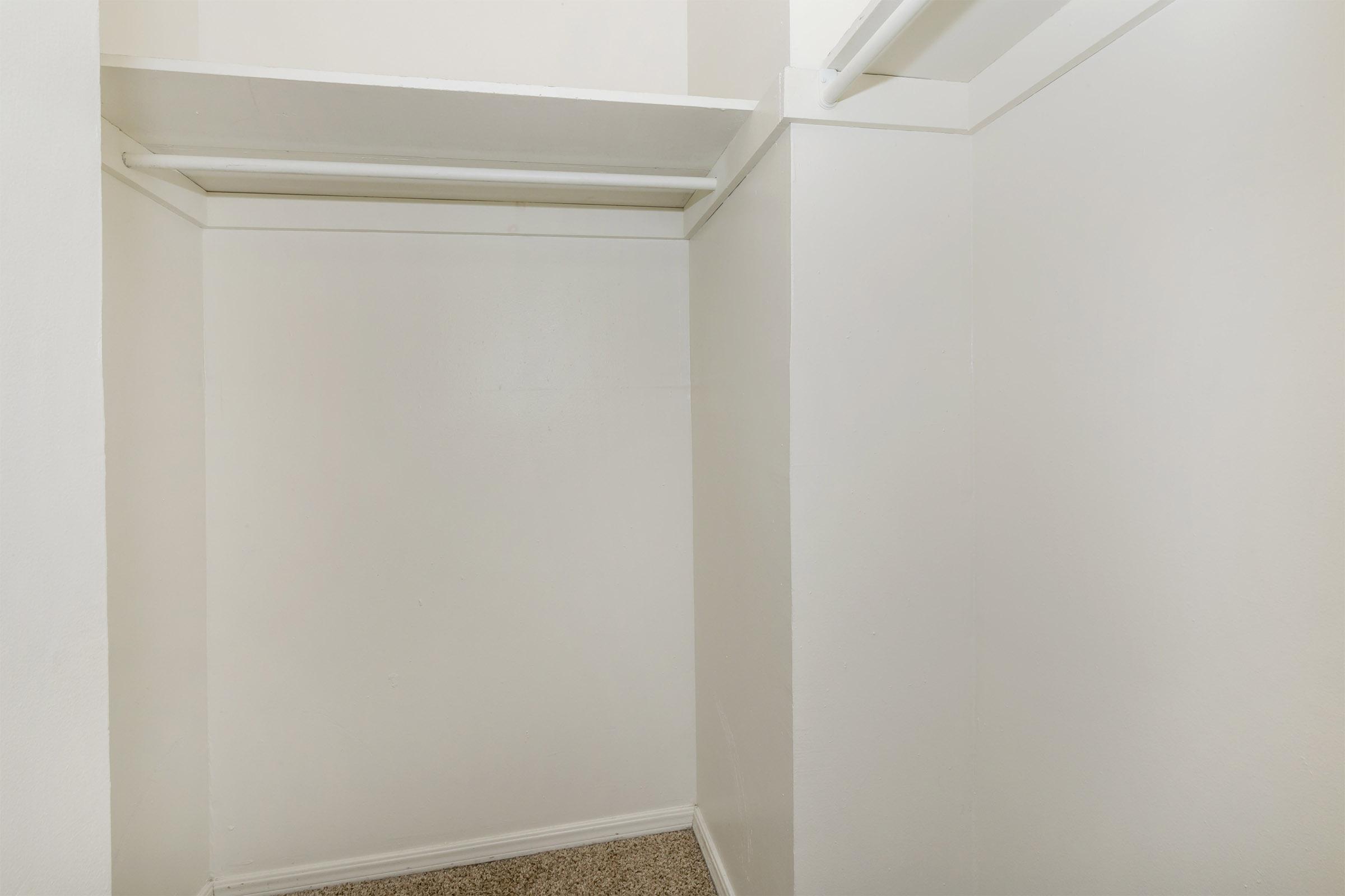 a white refrigerator freezer sitting in a room