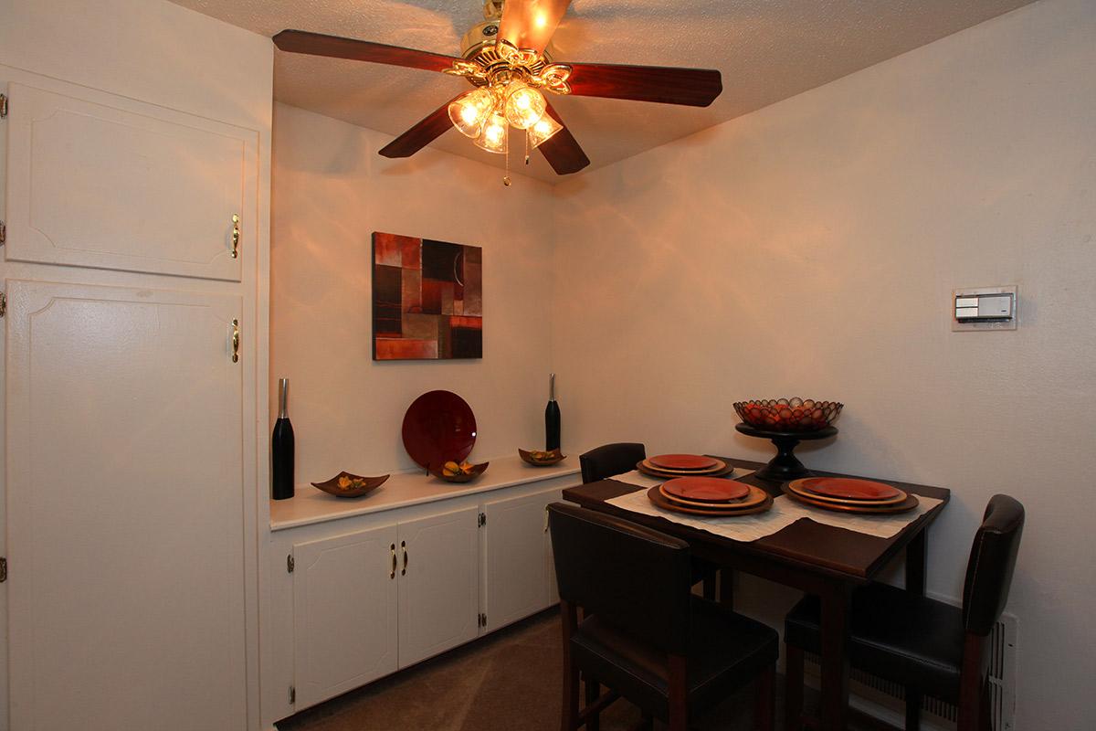 a kitchen with a table in a room