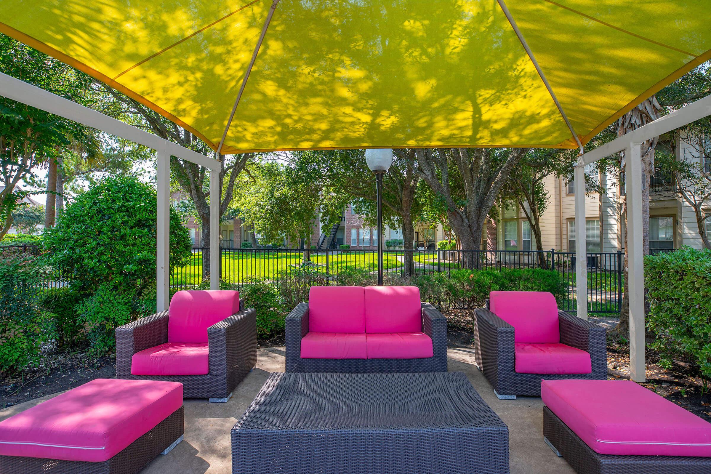 a row of lawn chairs sitting on top of a table