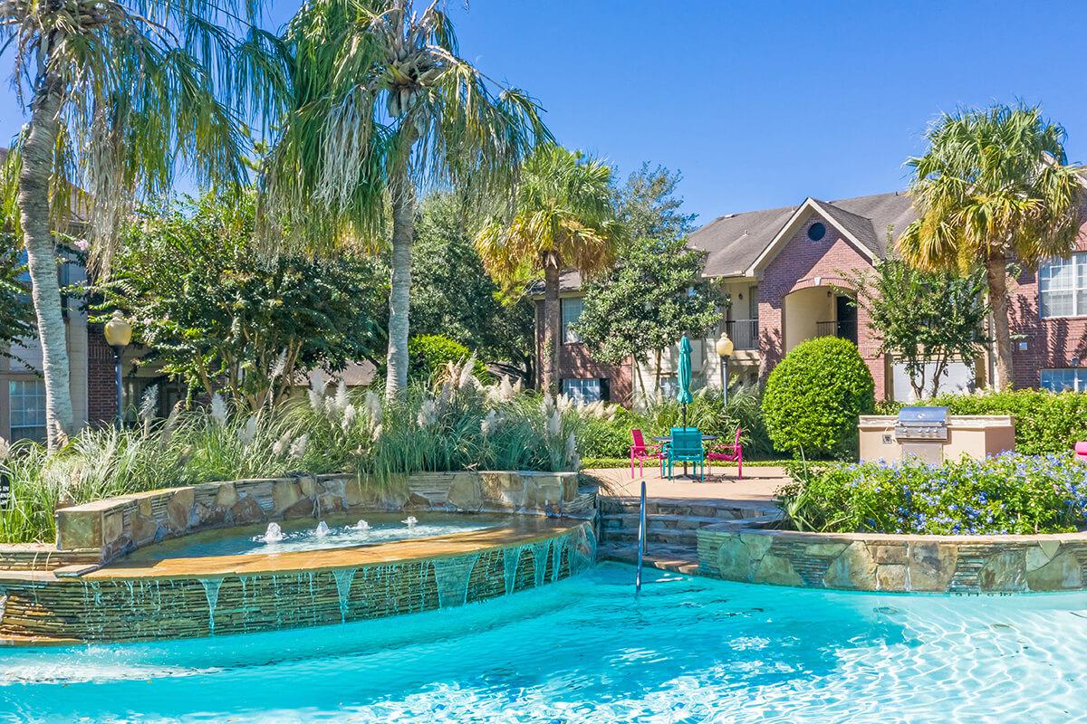 a small house in a pool of water